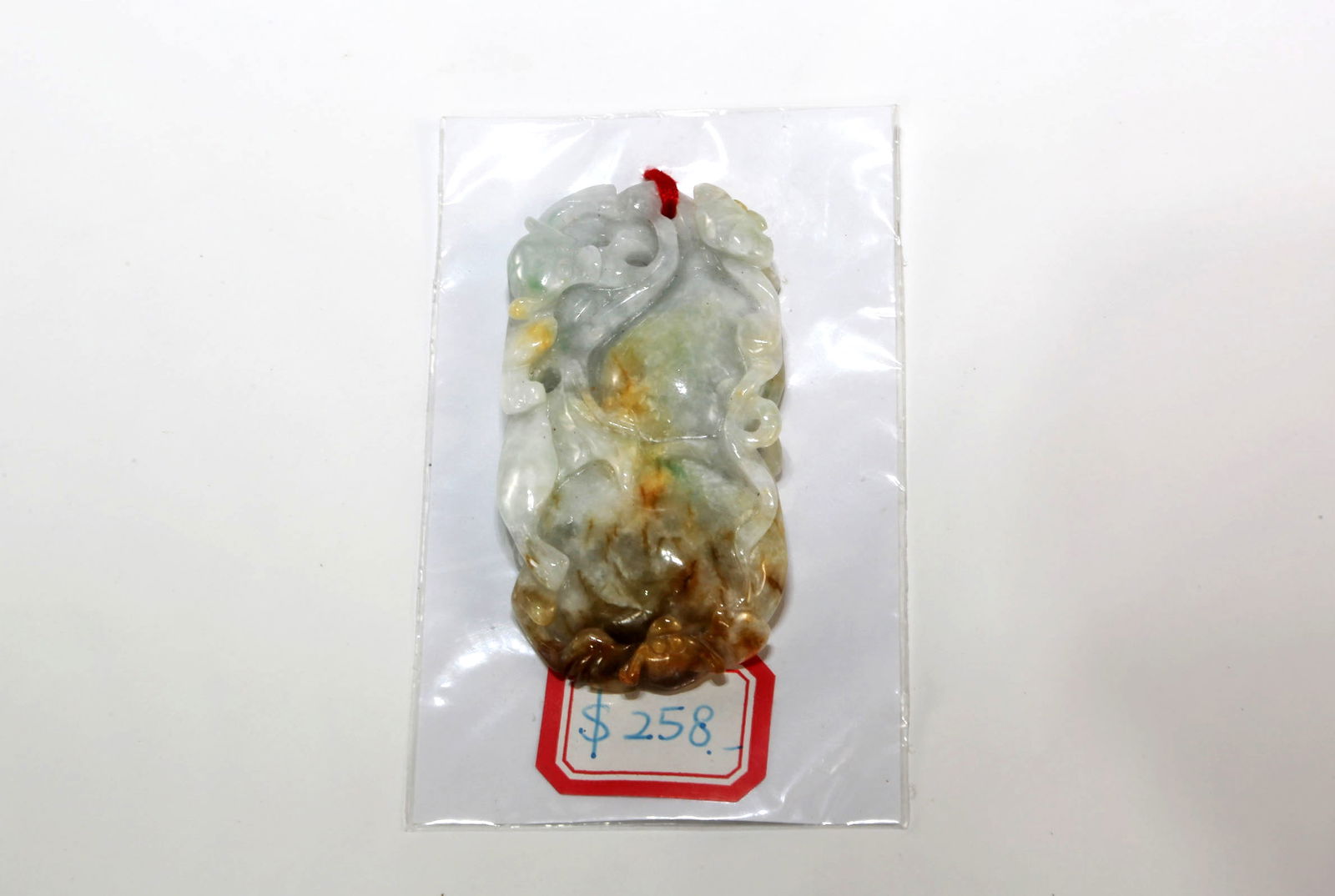Carved Chinese Jade Pendant: Carved Chinese jade pendant. Quite large. 2.5” x 1.3” x .25”. 39 grams.