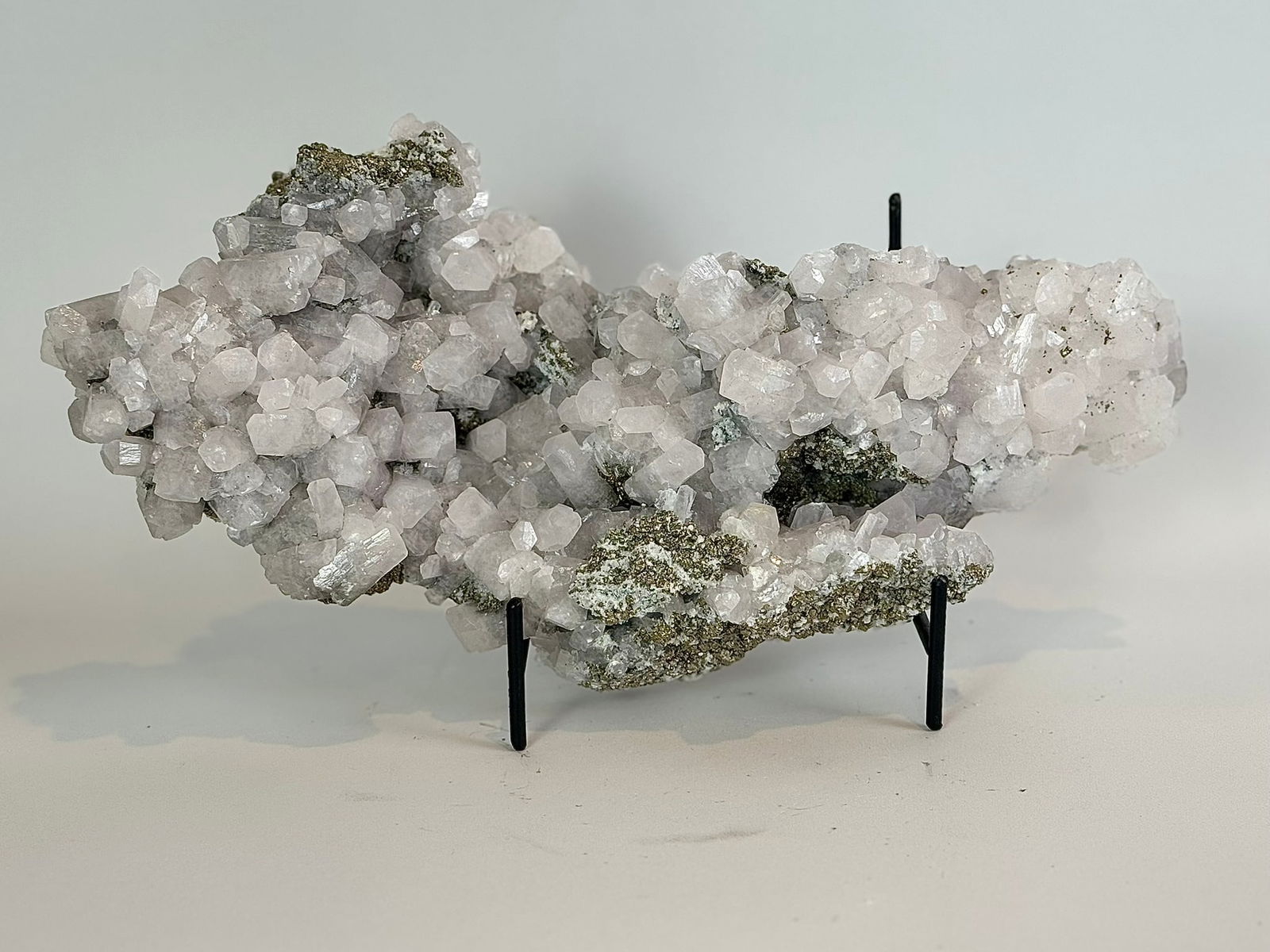 Fluorescent Calcite and Pyrite Formation: Highly fluorescent calcite and pyrite formation from Peru. 6.25” x 13.25” x 3.5”. 8 pounds.