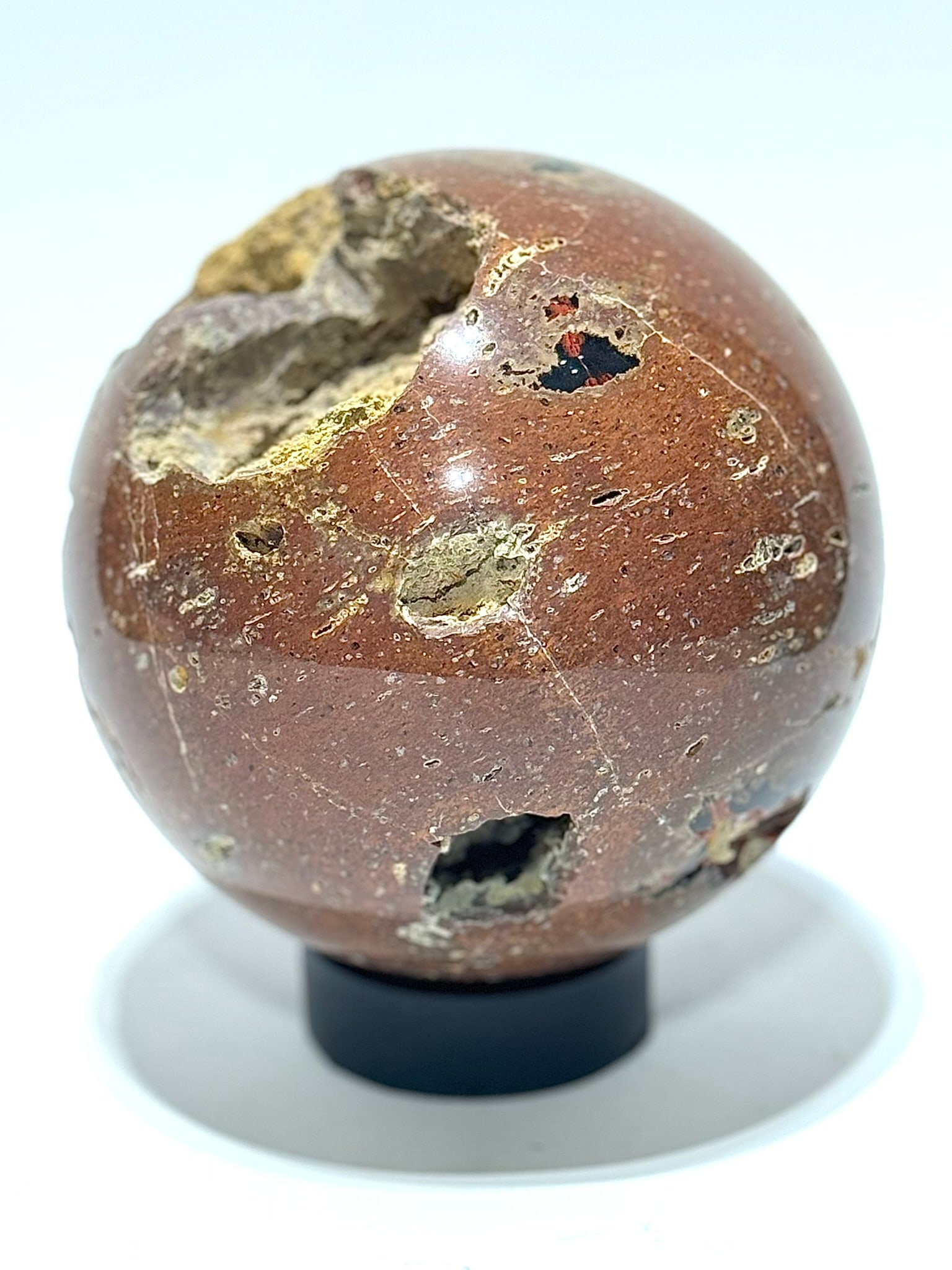 Large Agate Sphere: Large agate sphere with colorful canyons. 6" x 6" x 6". 7 pounds.