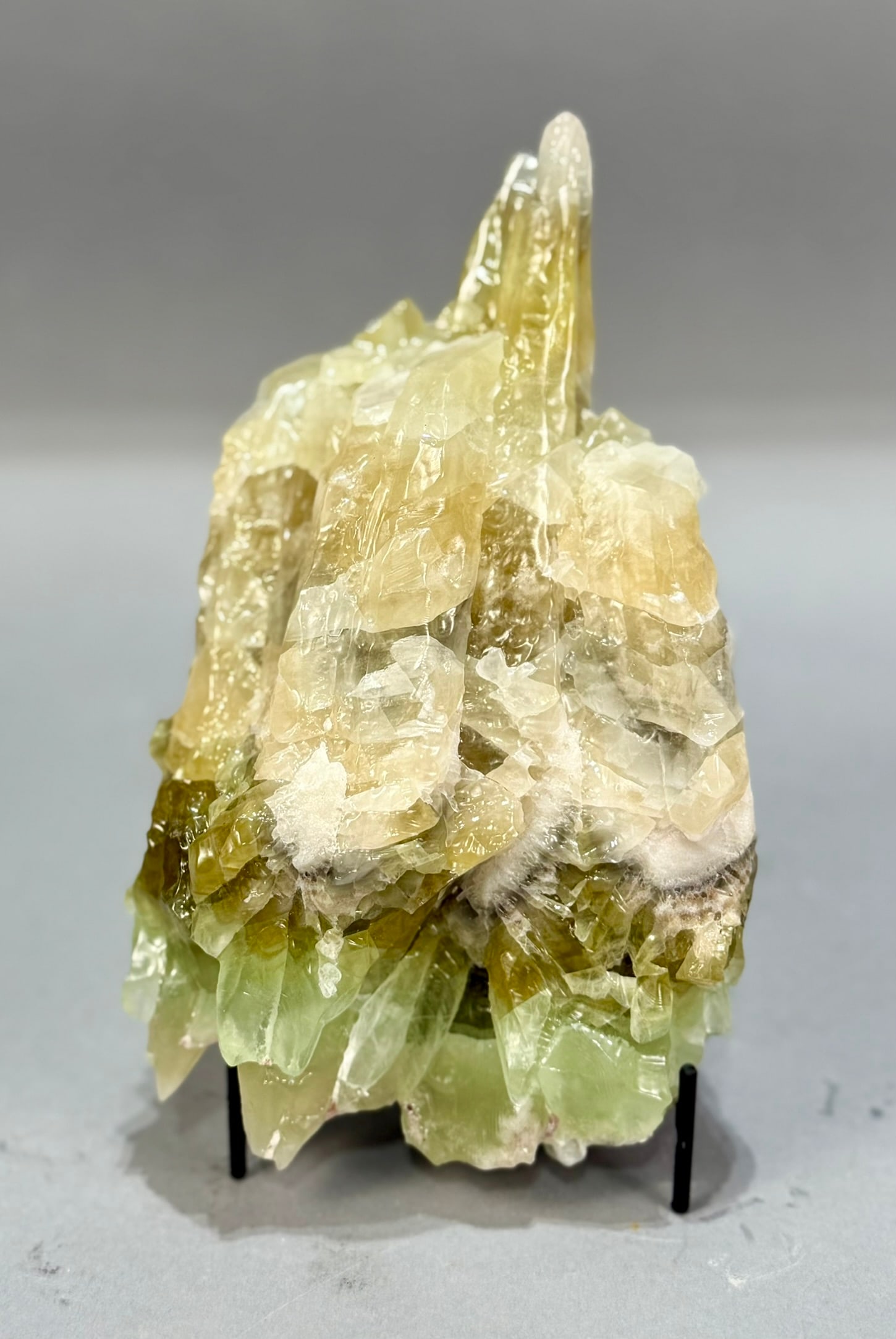 Green Calcite Torch Formation: Green calcite torch formation from Mexico. 8" x 4.5" x 3.25". 4 pounds, 2 ounces.