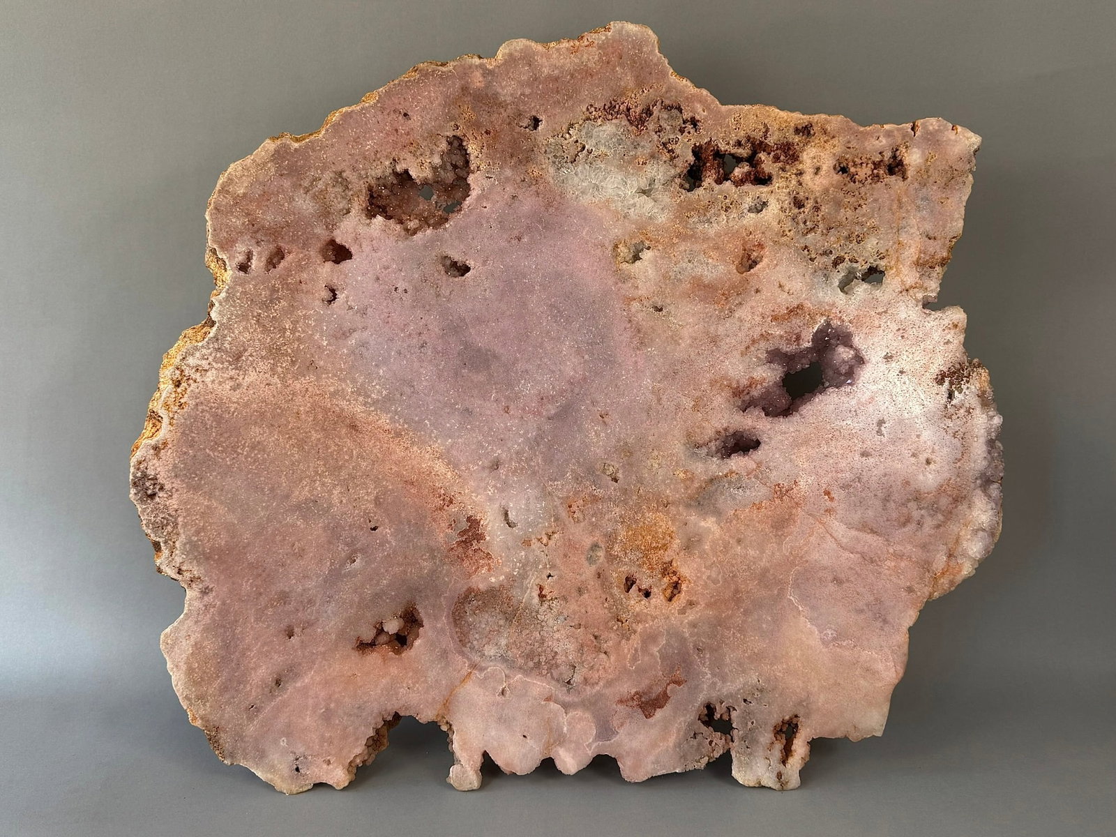 Huge Polished Pink Amethyst Slab: Huge polished pink amethyst slab from Brazil. 27” x 31" x 1.75". Appx 85 pounds. Would make a great table top.