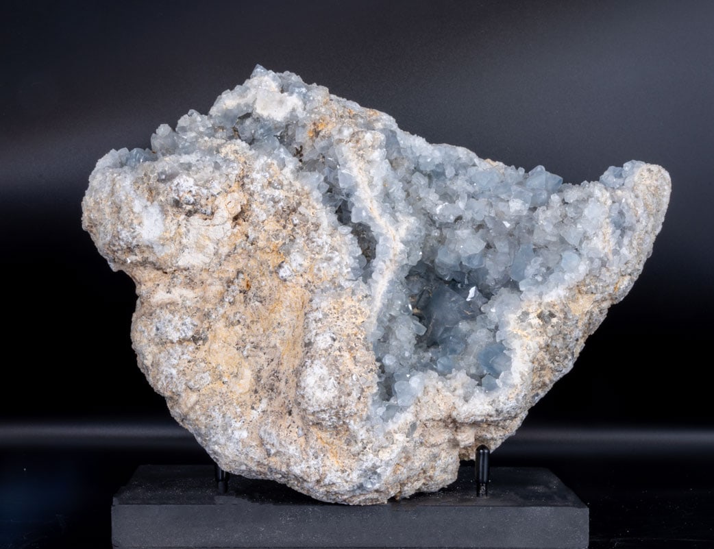 Celestite Geode: Celestite geode from Madagascar. 7.25" x 9.5" x 4.25". 14 pounds, 11 ounces.