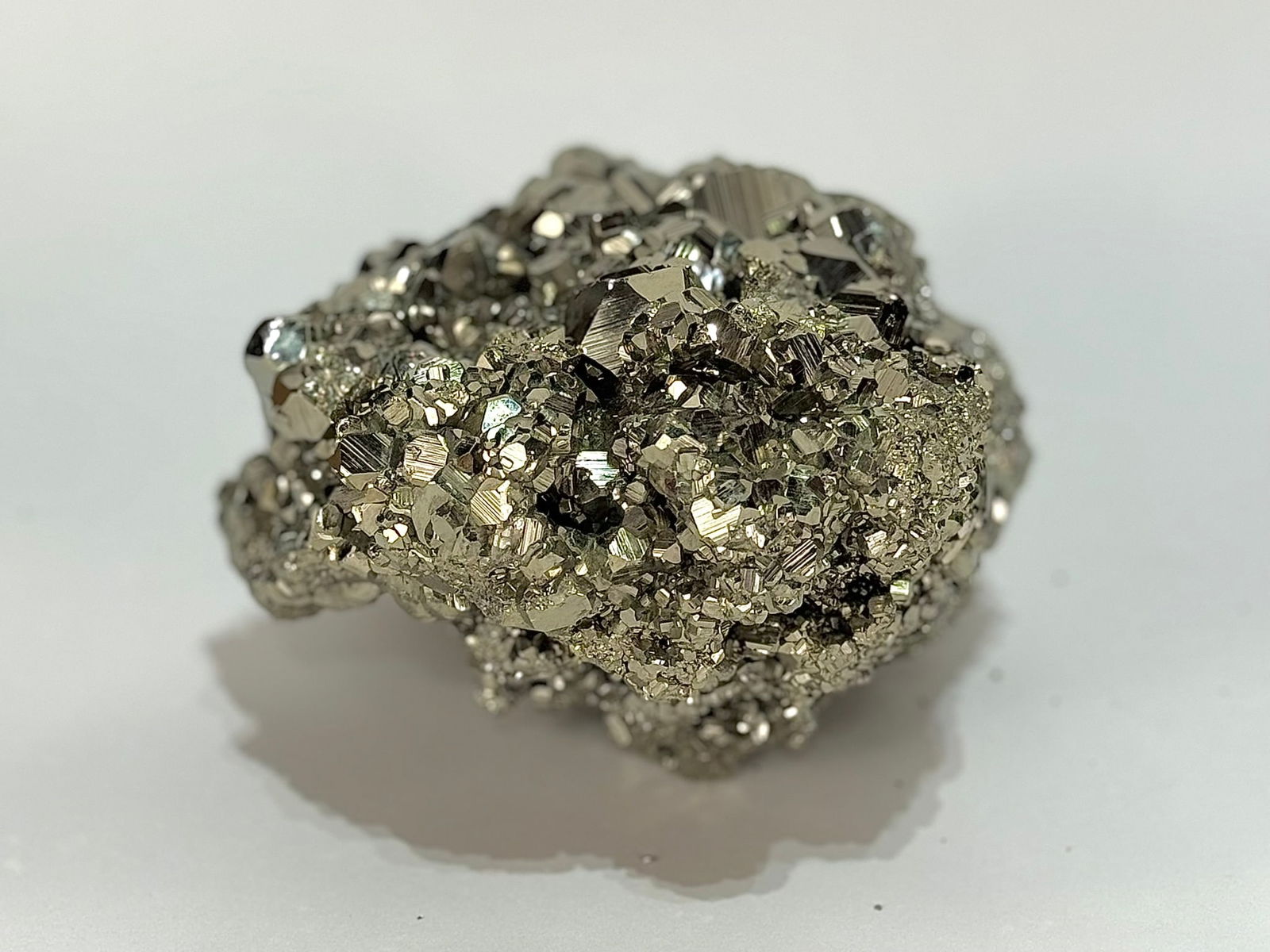 Top-notch Octahedral Pyrite Formation: Stunning and bright top-quality octahedral pyrite formation from the Huanzala Mine in Ancash, Peru. 5.5” x 6” x 3.5”. 6 pounds, 14 ounces.