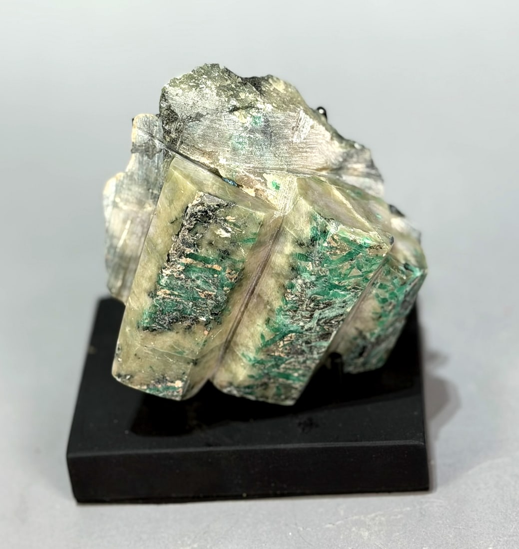 Polished Emeralds in Matrix: Polished emeralds in matrix from Brazil. 3.75”” x 4.25” x 1.75”. 1 pound, 4 ounces.