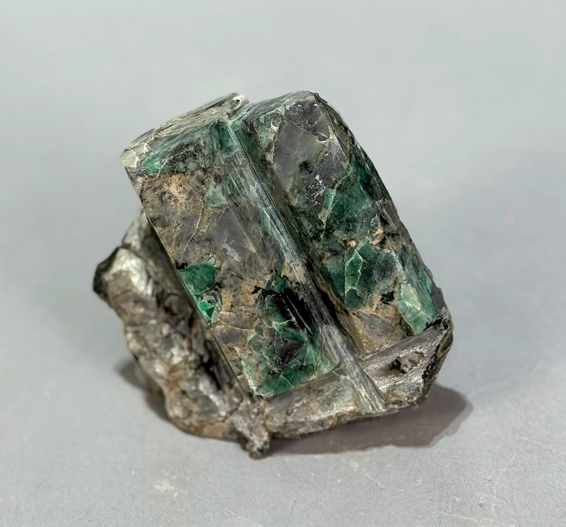 Polished Emeralds in Matrix: Polished emeralds in matrix from Brazil. 4” x 4” x 2”. 1 pound, 4 ounces.