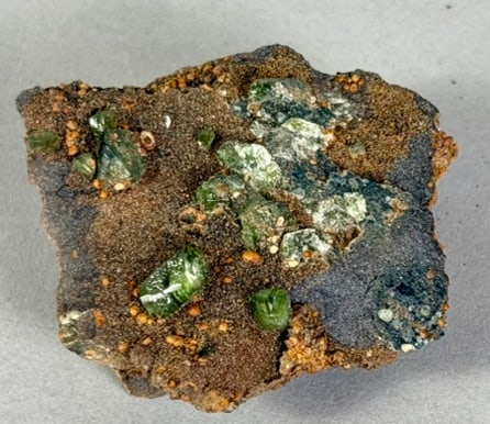 Small Ludlamite and Vivianite Specimen: Small Ludlamite and vivianite specimen from Brazil. 2.5” x 2.75” x 1”. 5 ounces.