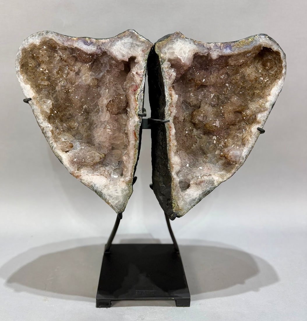 Amethyst Geode Butterfly Wings: Amethyst geode butterfly wings on custom stand from Brazil. 22” x 19” x 8”. 49 lbs.