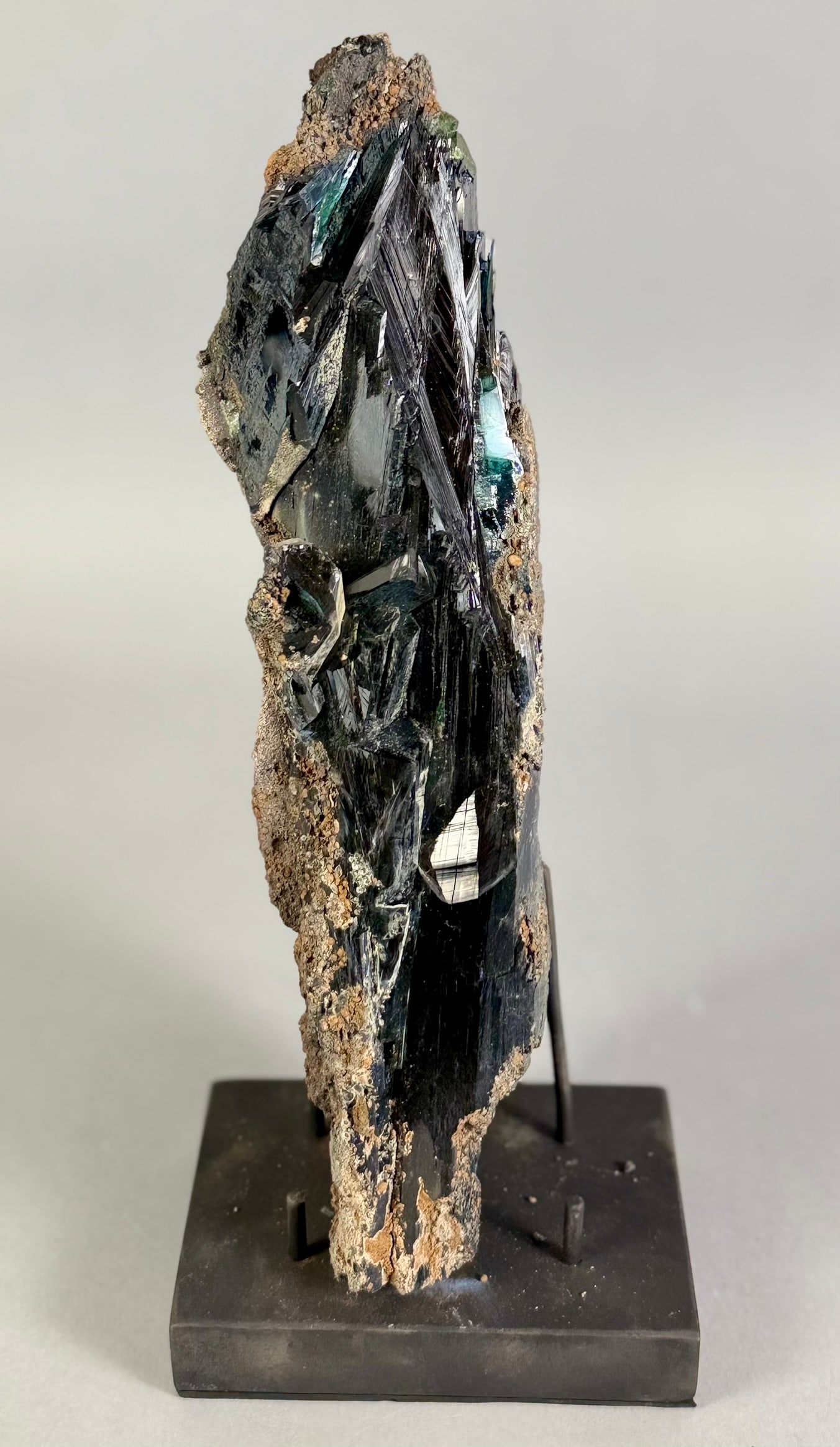 Ultra-Rare Vivianite Crystal Cluster: Ultra-rare, translucent green vivianite crystal cluster partially ensconced in matrix. Super high quality. 9.5" x 3.75" x 2.5". 2 lbs, 14 oz.