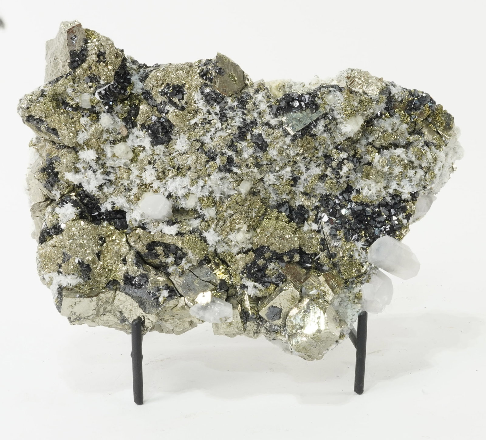 Cubic Pyrite, Sphalerite, Apatite and Fluorescent Calcite Formation: Extraordinary cubic pyrite, sphalerite, apatite and fluorescent calcite formation from the Huanzala Mine in Ancash, Peru. 8.5" x 5.5" x 3.25". 8 lbs, 10 oz.