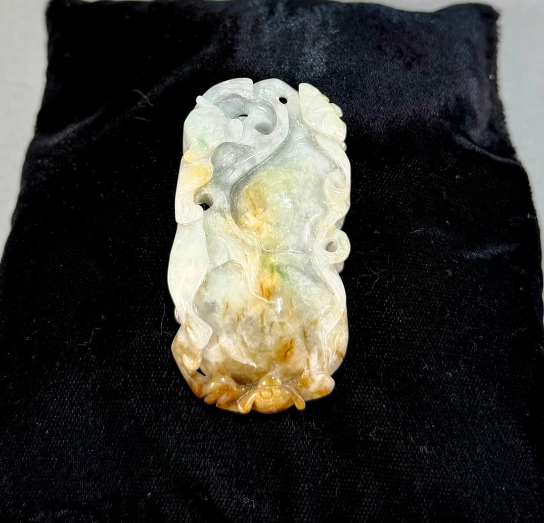 Carved Chinese Jade Pendant: Carved Chinese jade pendant. Quite large. 2.5” x 1.3” x .25”. 39 g.