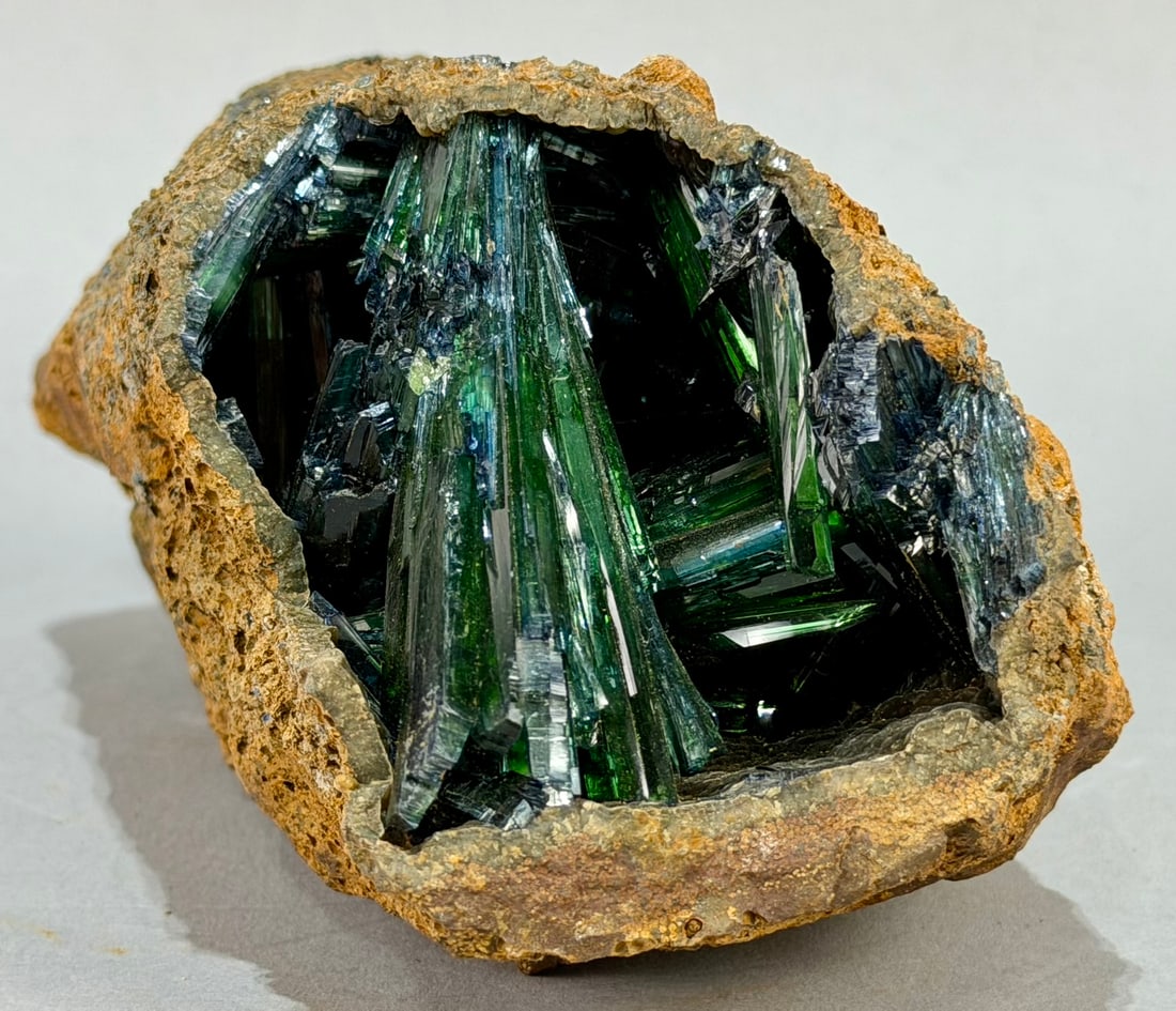 Ultra-Rare Vivianite Cannoli Crystal Formation: Ultra-rare, translucent green vivianite crystal cluster formation in the shape of a cannoli. Super high quality. 3.5" x 6" x 3". 2 pounds, 9 ounces.