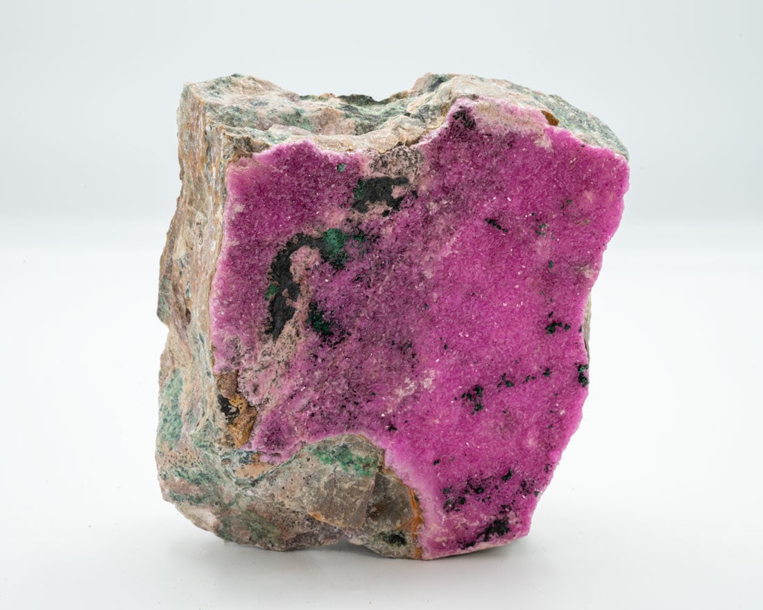 Rare Pink Cobaltoan Calcite with Malachite on Matrix: Rare, vivid, pink cobaltoan calcite with malachite from the DR Congo. 3.75" x 4.5" x 2". 1,166 g.
