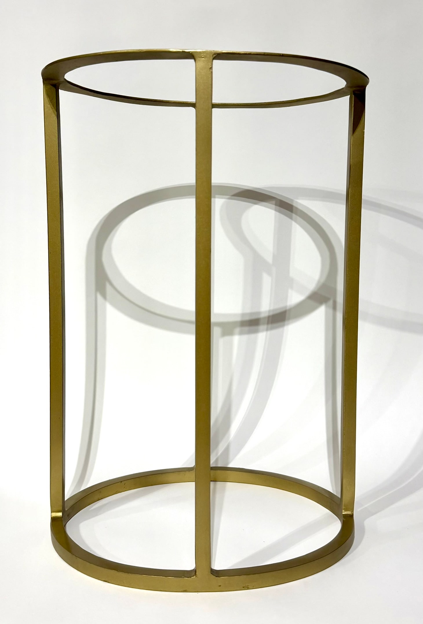 Iron Accent Table Base for Rock or Wood Slab: Iron accent table base for rock or wood slab with brass finish. 16” x 11” x 9”. 6 pounds, 3 ounces.