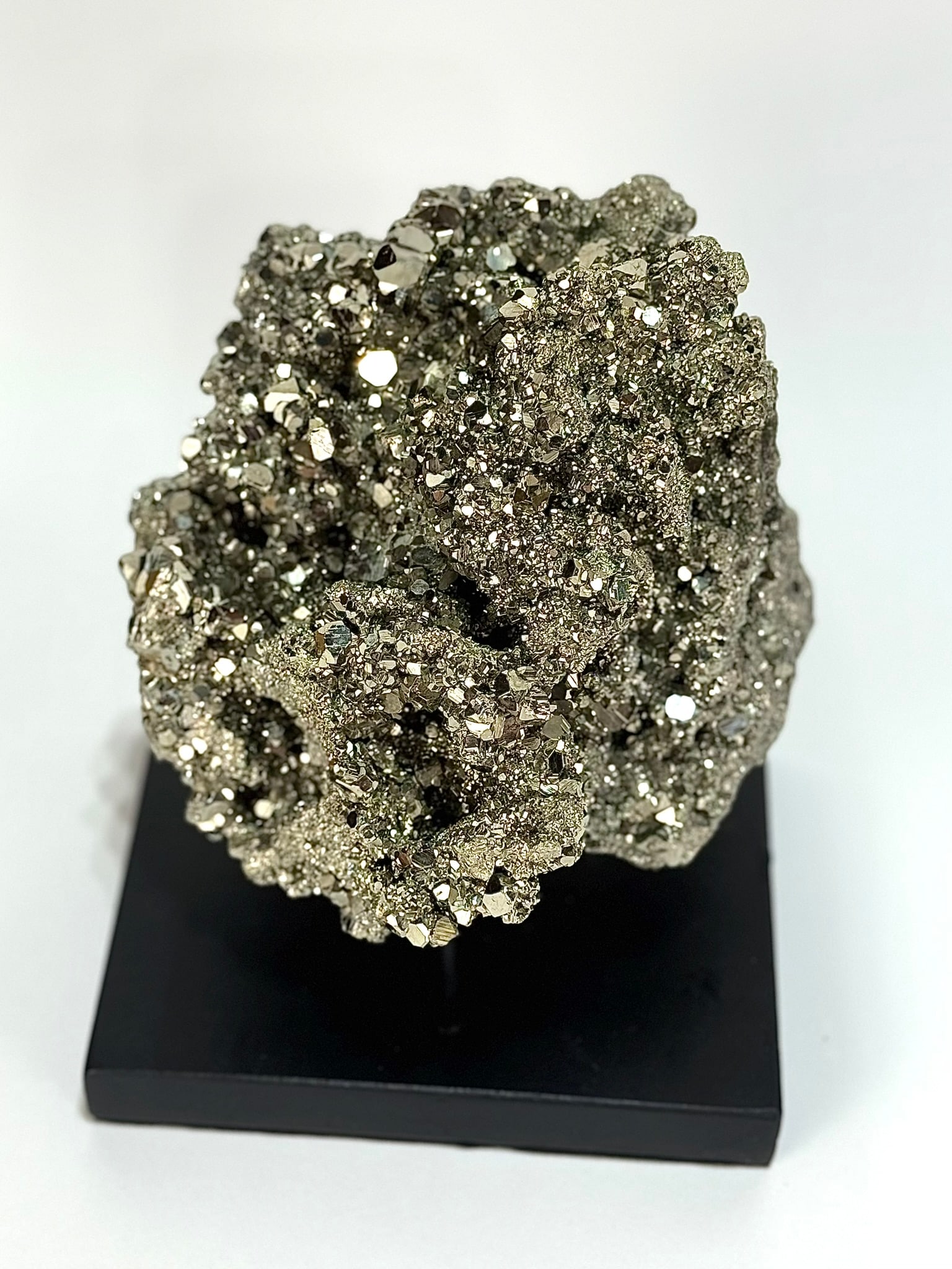 Top-notch Pyrite Formation: Stunning and bright top-quality pyrite formation from the Huanzala Mine in Ancash, Peru. 5.5” x 6.5” x 4.5”. 6 lbs, 10 oz.