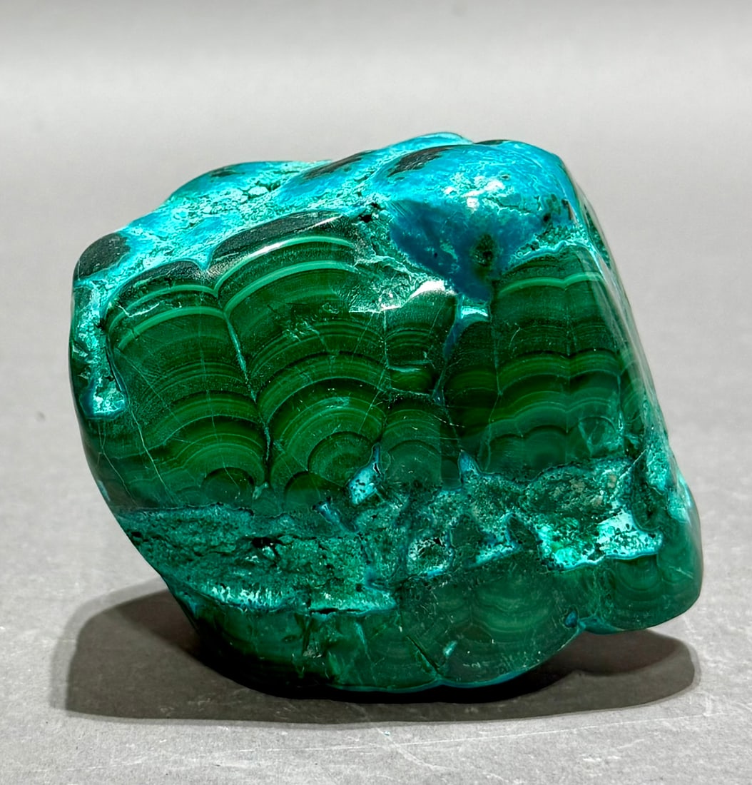 Polished Malachite and Chrysocolla Formation: Polished malachite and chrysocolla formation from the DR Congo. 2.75” x 3" x 2.25". 1 lbs, 9 oz.