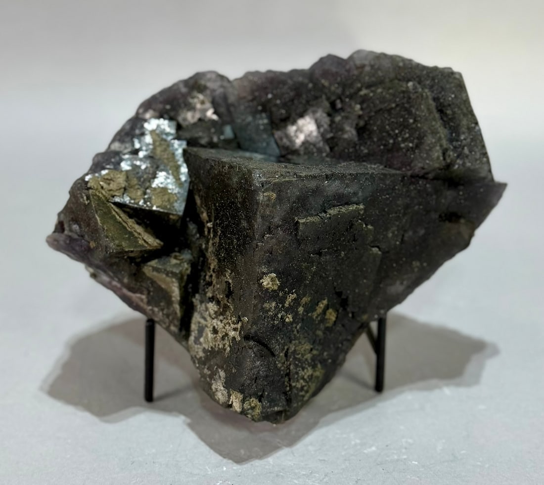 Cubic Fluorite Specimen: Deep purple cubic fluorite specimen from the Akwana Deposit in Logo, Benue, Nigeria. 6" x 8" x 5". 8 lb, 9 ounces.
