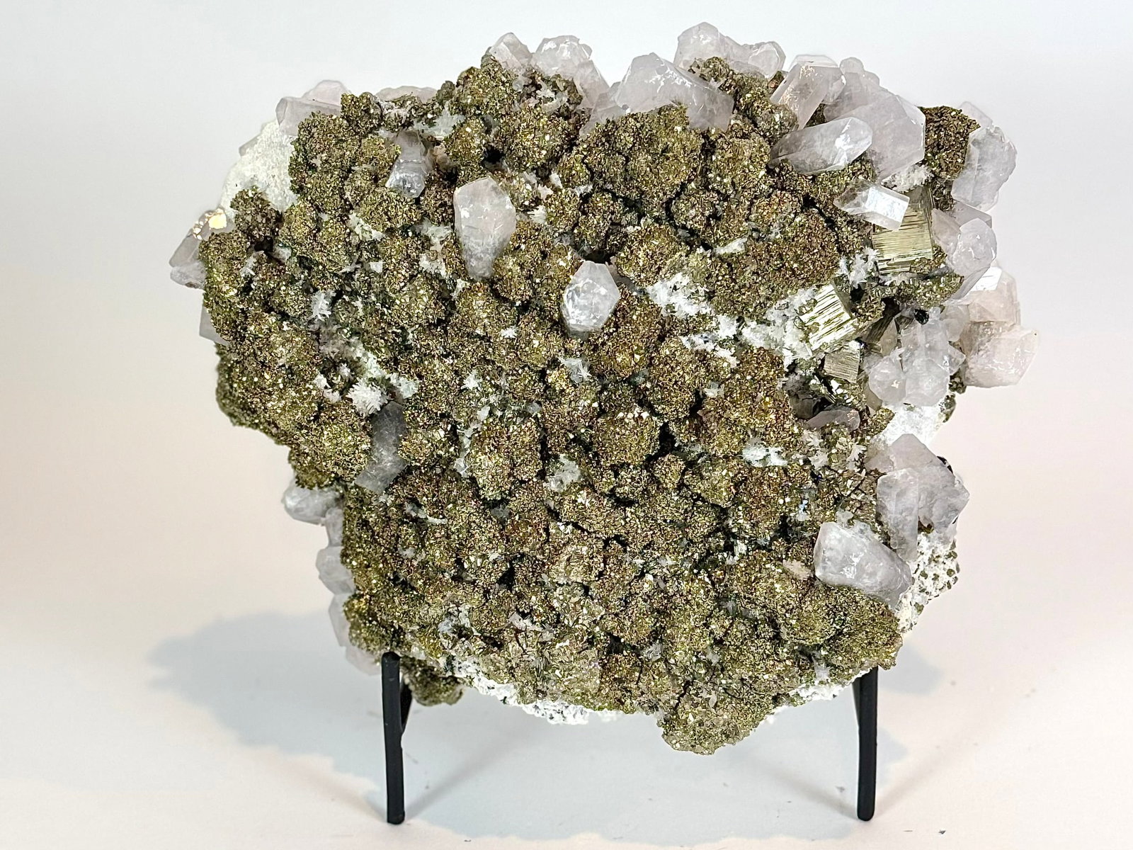 Cubic Pyrite, Chalcopyrite and Fluorescent Calcite Specimen: Cubic pyrite, chalcopyrite and extraordinarily fluorescent calcite formation from the Huanzala Mine in Ancash, Peru. 7" x 9" x 5". 8 lbs, 7 oz.