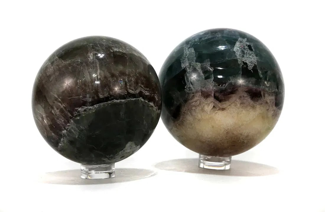 Two Polished Fluorite Spheres: Two polished fluorite spheres from China. 760 grams.