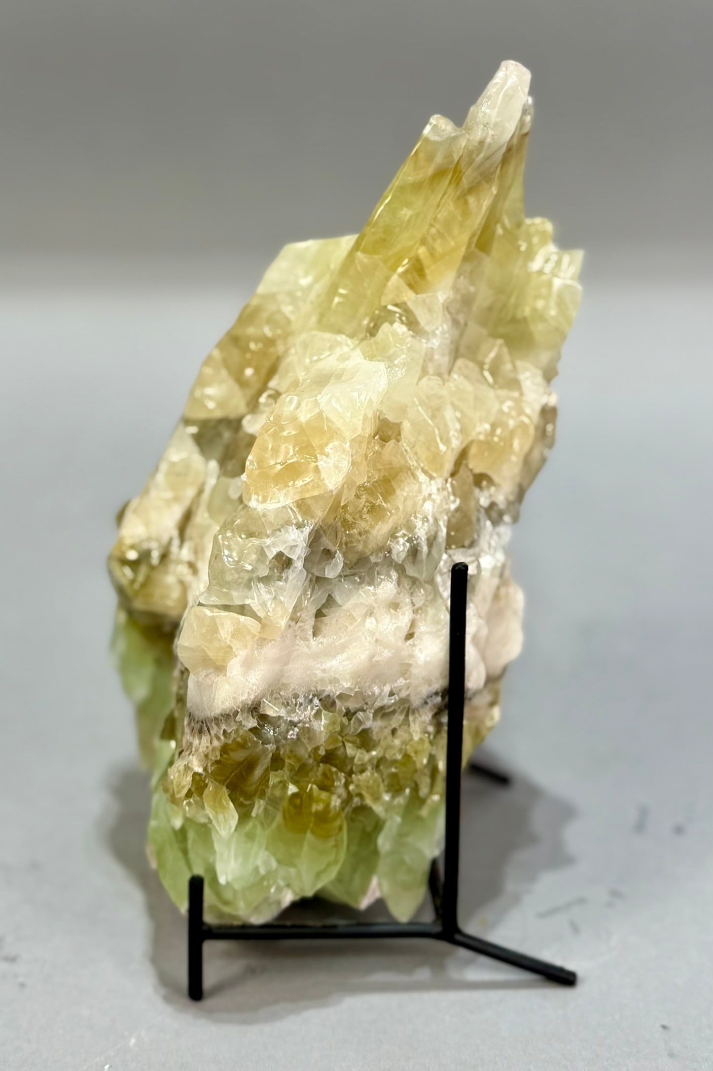 Green Calcite Torch Formation: Green calcite torch formation from Mexico. 8" x 4.5" x 3.25". 4 lbs, 2 oz.