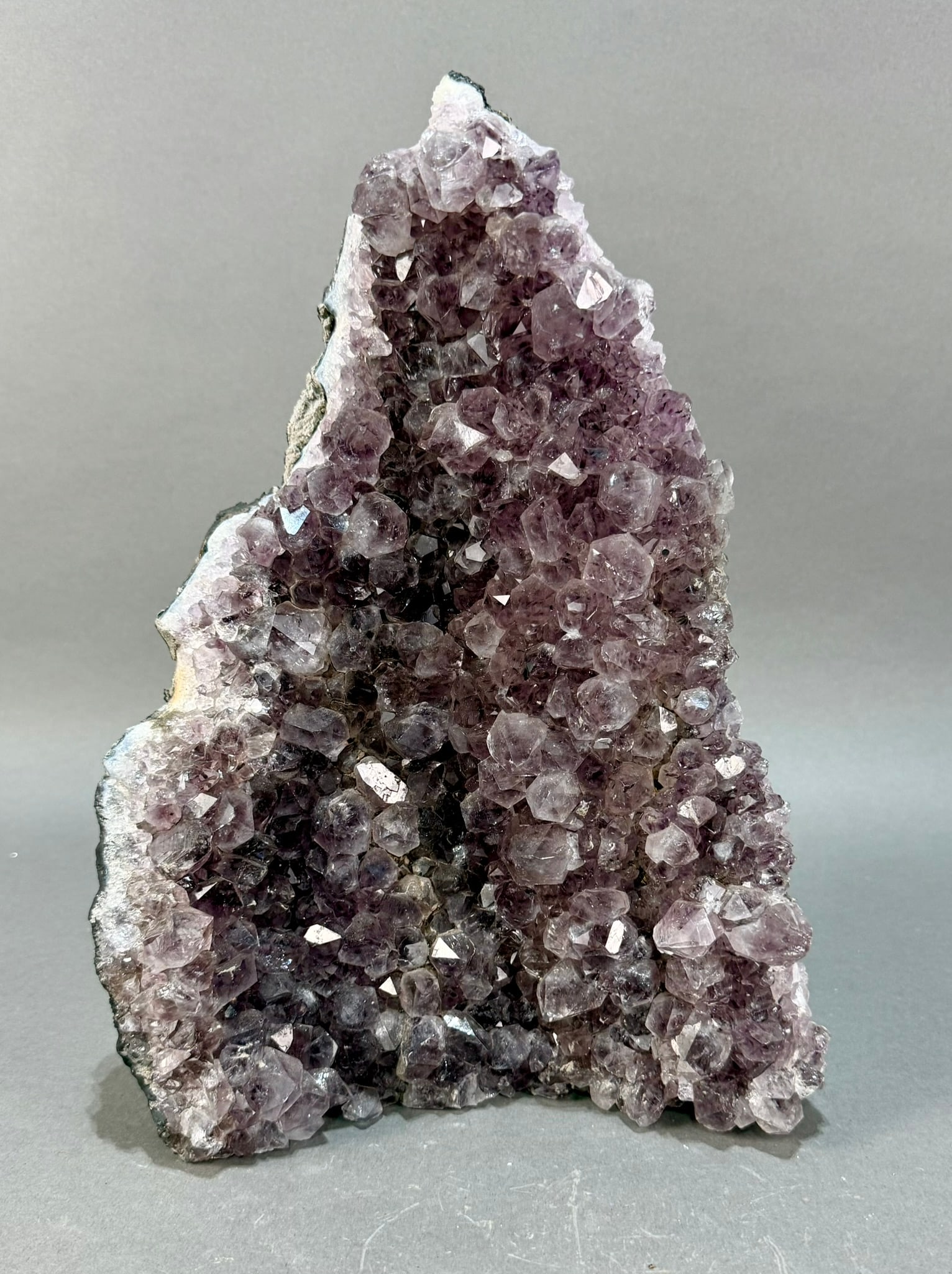 Amethyst Cluster: Amethyst Cluster from Brazil. 12" x 9" x 4.5". 12 lb, 2 ounces.