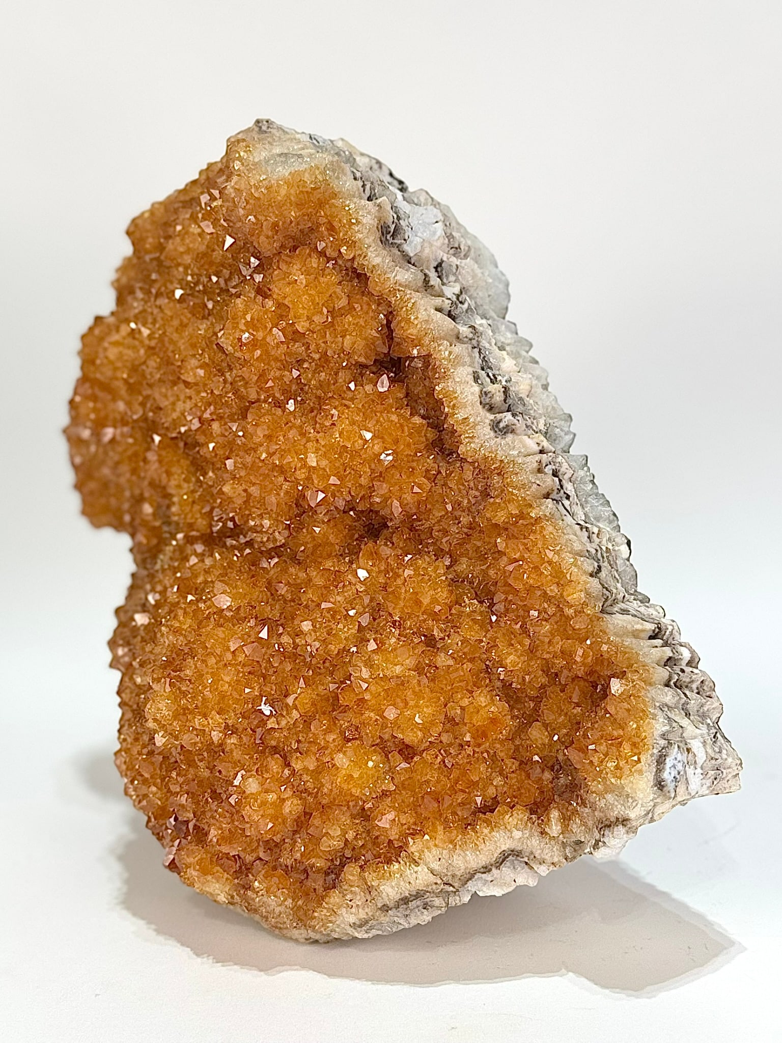 Large Citrine Cluster: Large, bubbly citrine cluster from Brazil. 9" x 9.5" x 5". 17 lbs, 1 ounce.