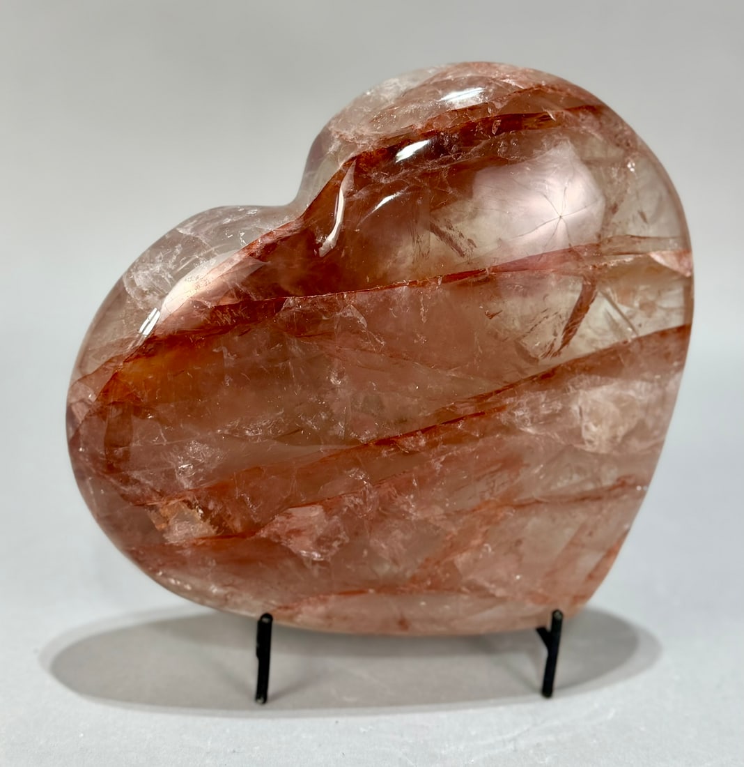 Polished Hematoid Quartz Heart: Polished hematoid quartz heart from Madagascar. 6.5” x 7.75” x 2.25". 5 lbs, 9 oz.