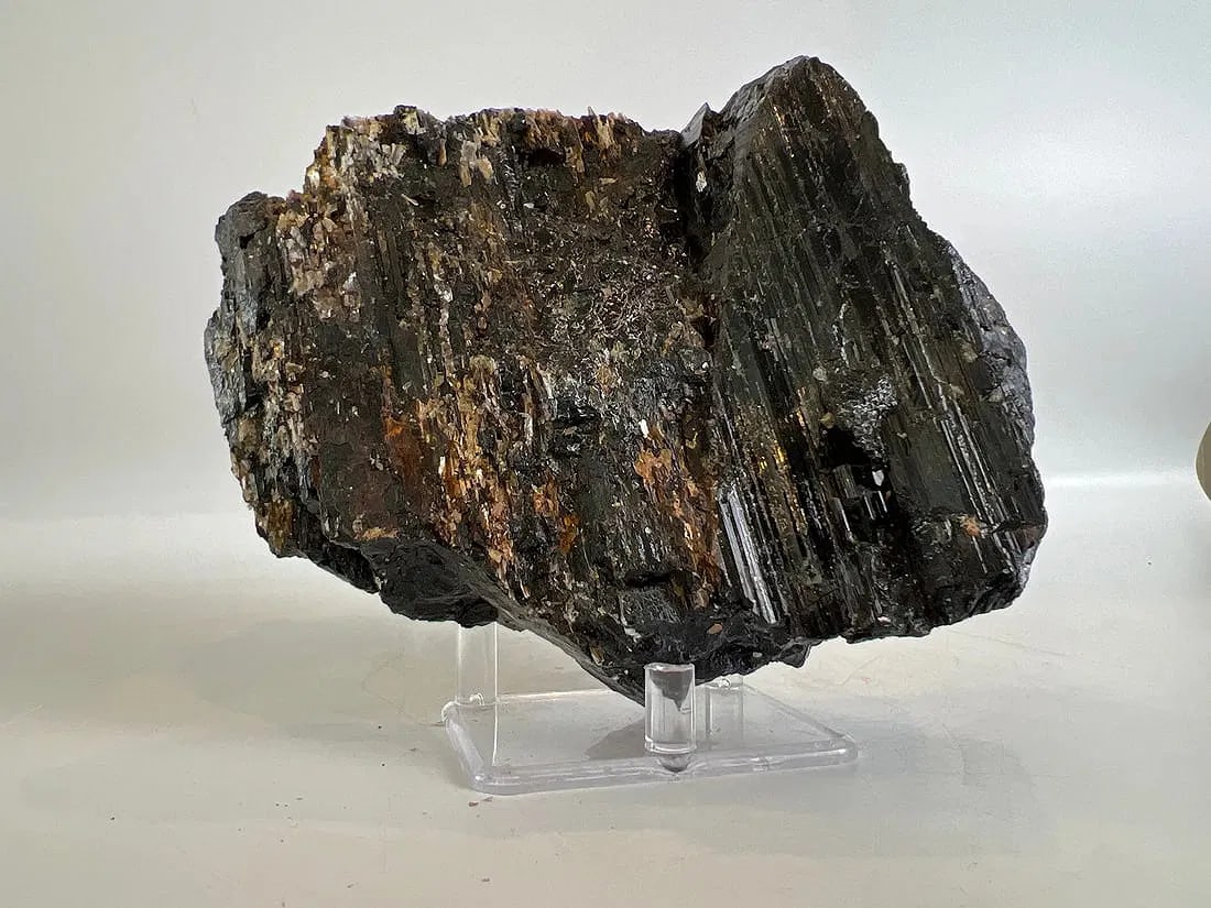 Black Tourmaline and Golden Mica Formation: Black tourmaline and golden mica formation. 4" x 6" x 3". 3 lb, 1 ounce.
