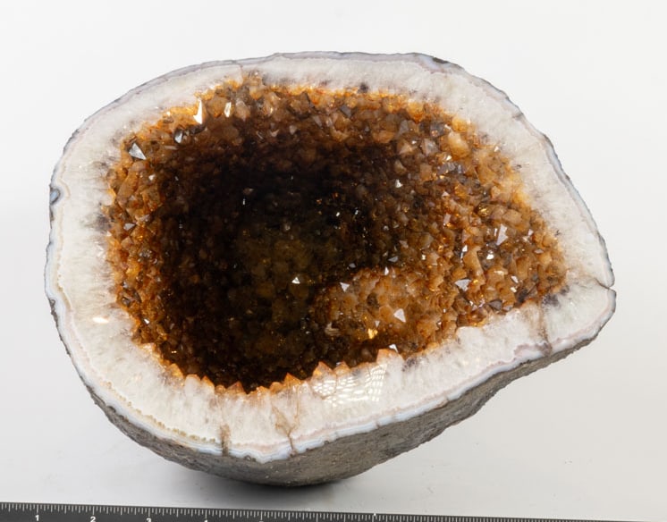 Large Citrine Vug Geode: Large and deep orange citrine vug geode with incredible color from Brazil. 10" x 10" x 14". 26 lbs, 13 oz.