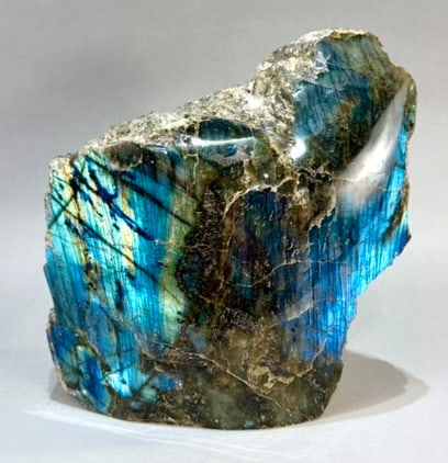 Live Edge Labradorite Freeform: Large, live edge, front-polished labradorite freeform from Madagascar. 9" x 8.75” x 3.75". 16 lb, 2 ounces.