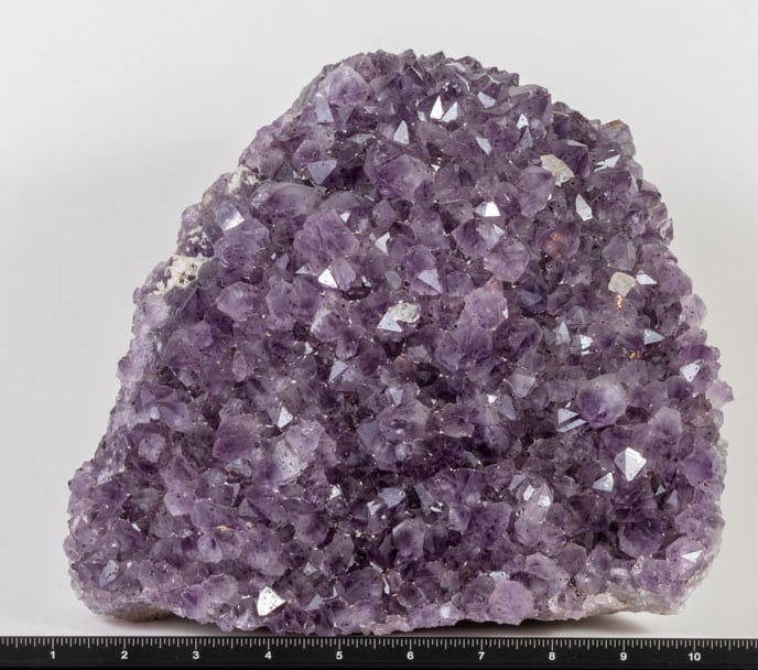 Amethyst Cluster with Goethite Inclusions: Beautiful amethyst plate with goethite inclusions from Brazil. 8" x 10" x 2.5". 19 lbs, 2 oz.