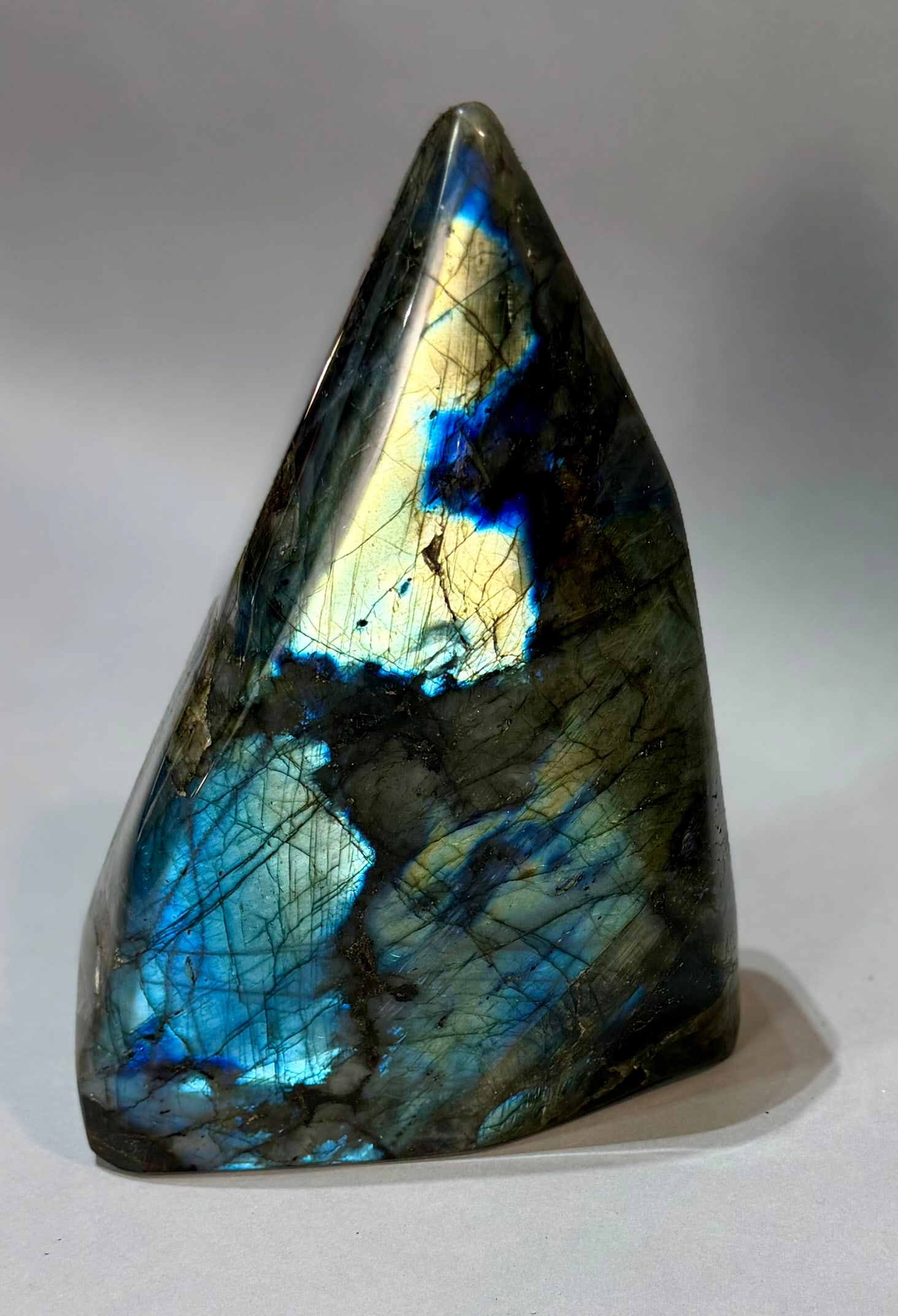 Large Polished Labradorite Freeform: Large polished labradorite freeform from Madagascar. 9" x 6” x 2.5". 9 lb, 11 ounces.