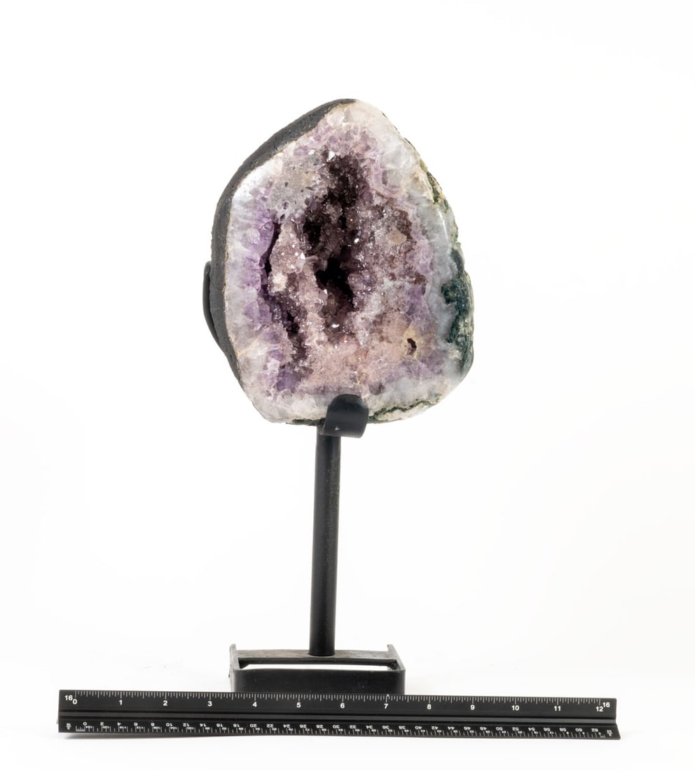Amethyst Geode on Tall Stand: Amethyst geode on tall black metal stand from Brazil. 14" x 6" x 6". 11 lbs, 3 oz.