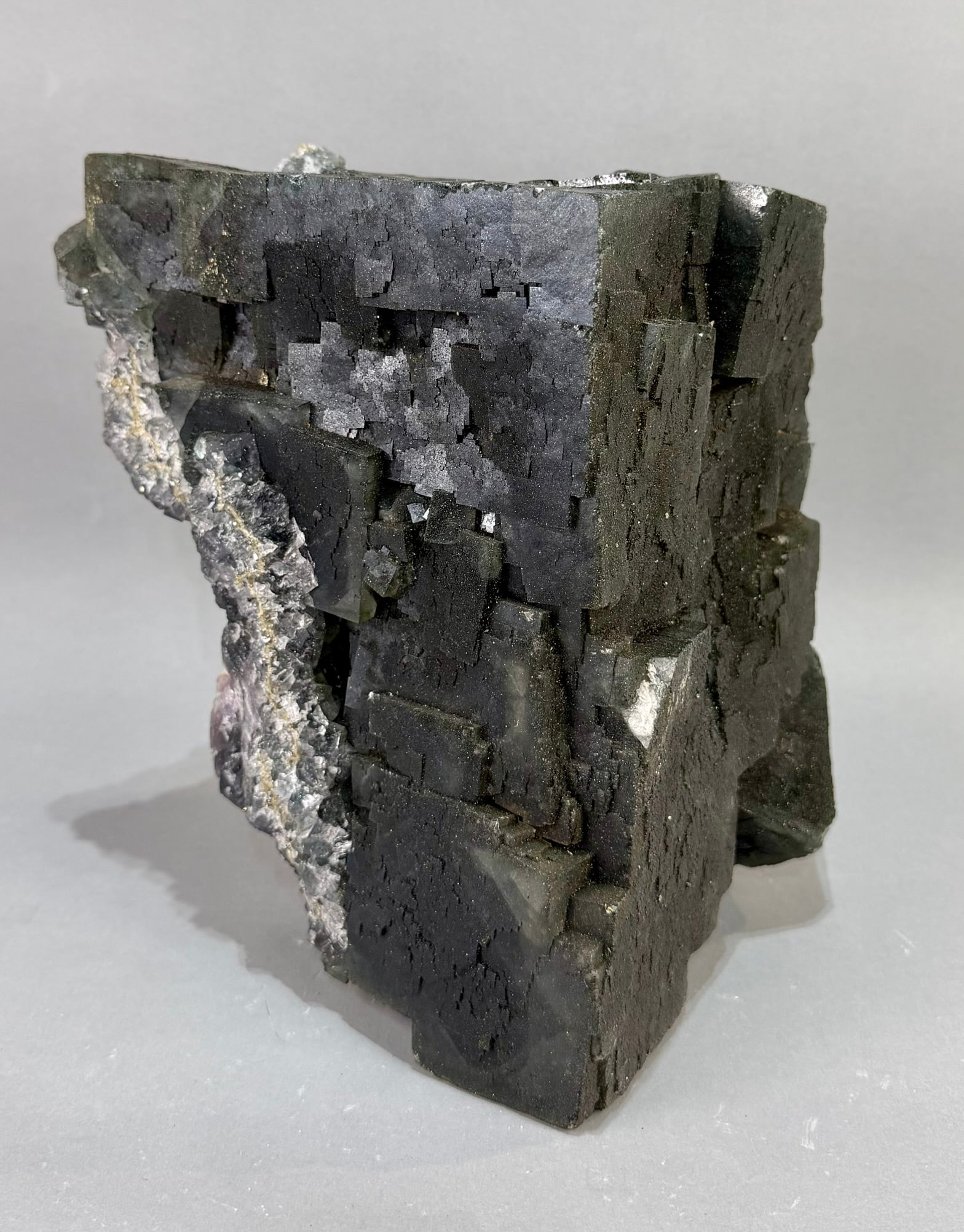 Huge Cubic Fluorite Specimen: Huge, deep purple cubic fluorite specimen from the Akwana Deposit in Logo, Benue, Nigeria. 10" x 8.5" x 8". 34 lb, 10 ounces.