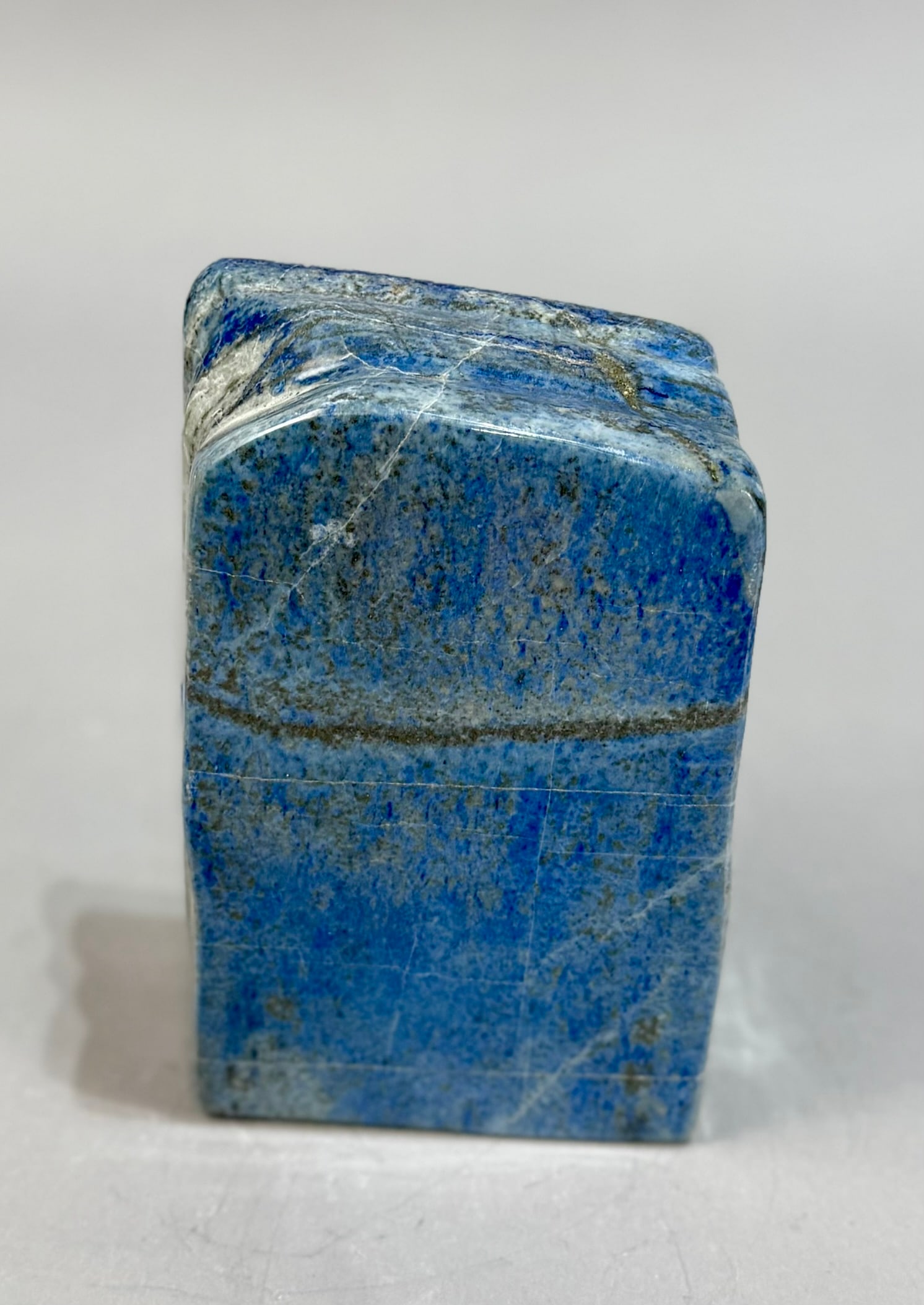 Denim Lapis Lazuli Freeform: Finely polished denim lapis lazuli freeform from Afghanistan. 6.25” x 4” x 2”. 5 lbs, 5 oz.