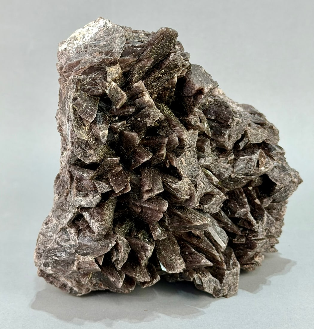 Rare Axinite Formation: Rare bladed axinite formation from Peru. 5.5" x 7" x 4.5". 6 lb, 12 ounces.