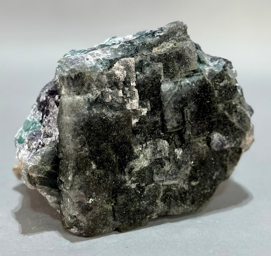 Purple and Green Cubic Fluorite Specimen: Purple and green cubic fluorite specimen from the Akwana Deposit in Logo, Benue, Nigeria. 6.5" x 5.75" x 4". 6 lb, 11 ounces.