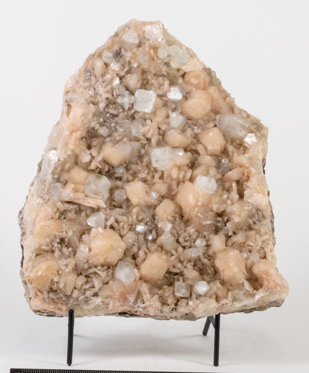 Apophyllite and Peach Stilbite Cluster: Clear apophyllite and peach stilbite cluster from Maharashtra, India. 10" x 8.5" x 3". 10 lbs.