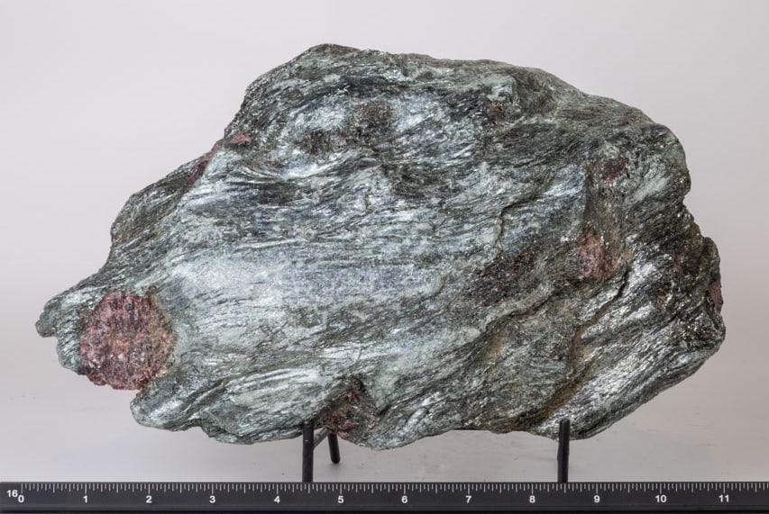 Fuchsite Formation with Interspersed Garnet Crystals: Large fuchsite formation with interspersed, large garnet crystals. 7.5" x 12" x 2.5". 11 lbs, 1 ounce.