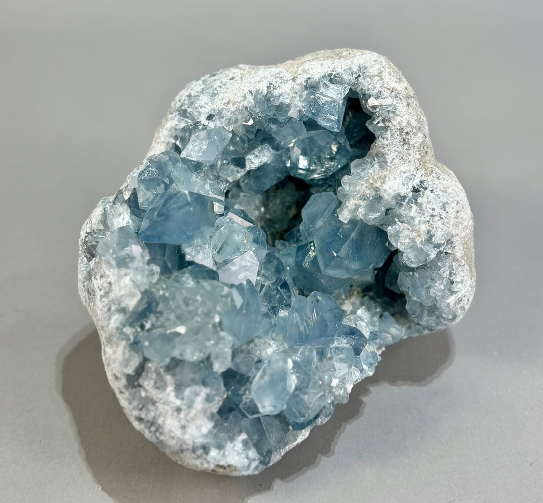 Exceptional Celestite Geode: Large, deep blue celestite geode with large crystals from Madagascar. 6” x 7” x 4.5”. 11 lbs, 10 oz.
