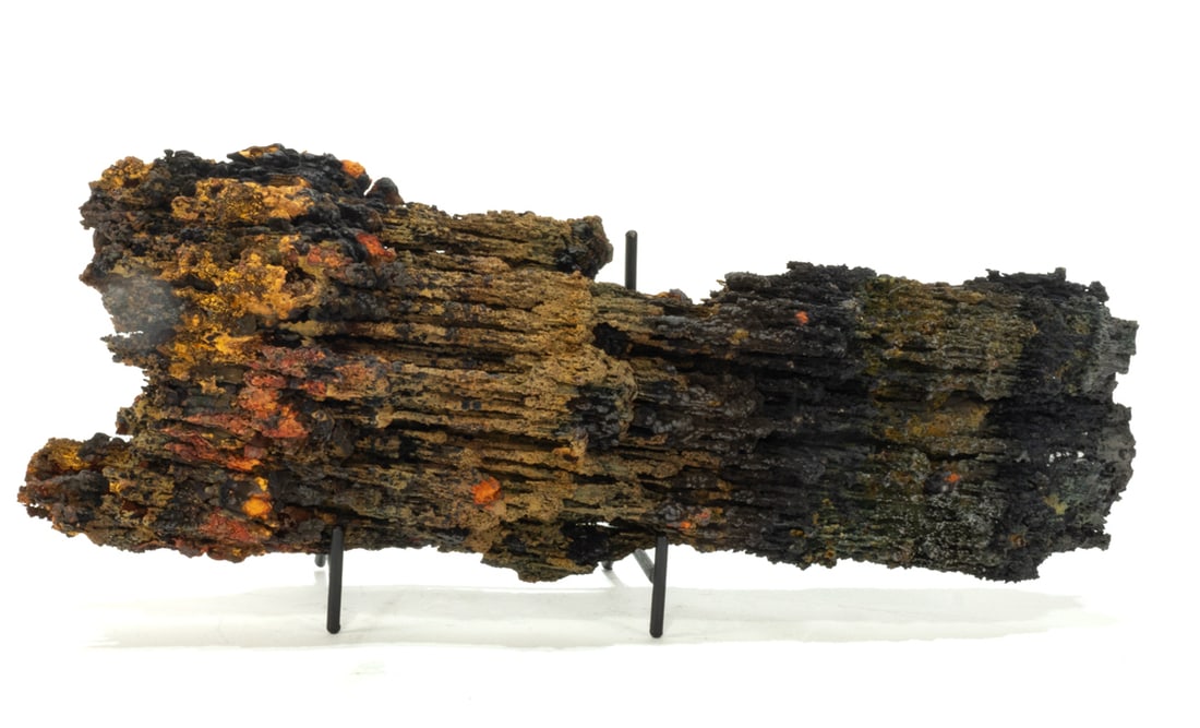 Colorful Goethite Formation: Multi-colored goethite stalactite specimen from Chihuahua, Mexico. 4" x 11.5" x 3". 2 lbs, 7 oz.