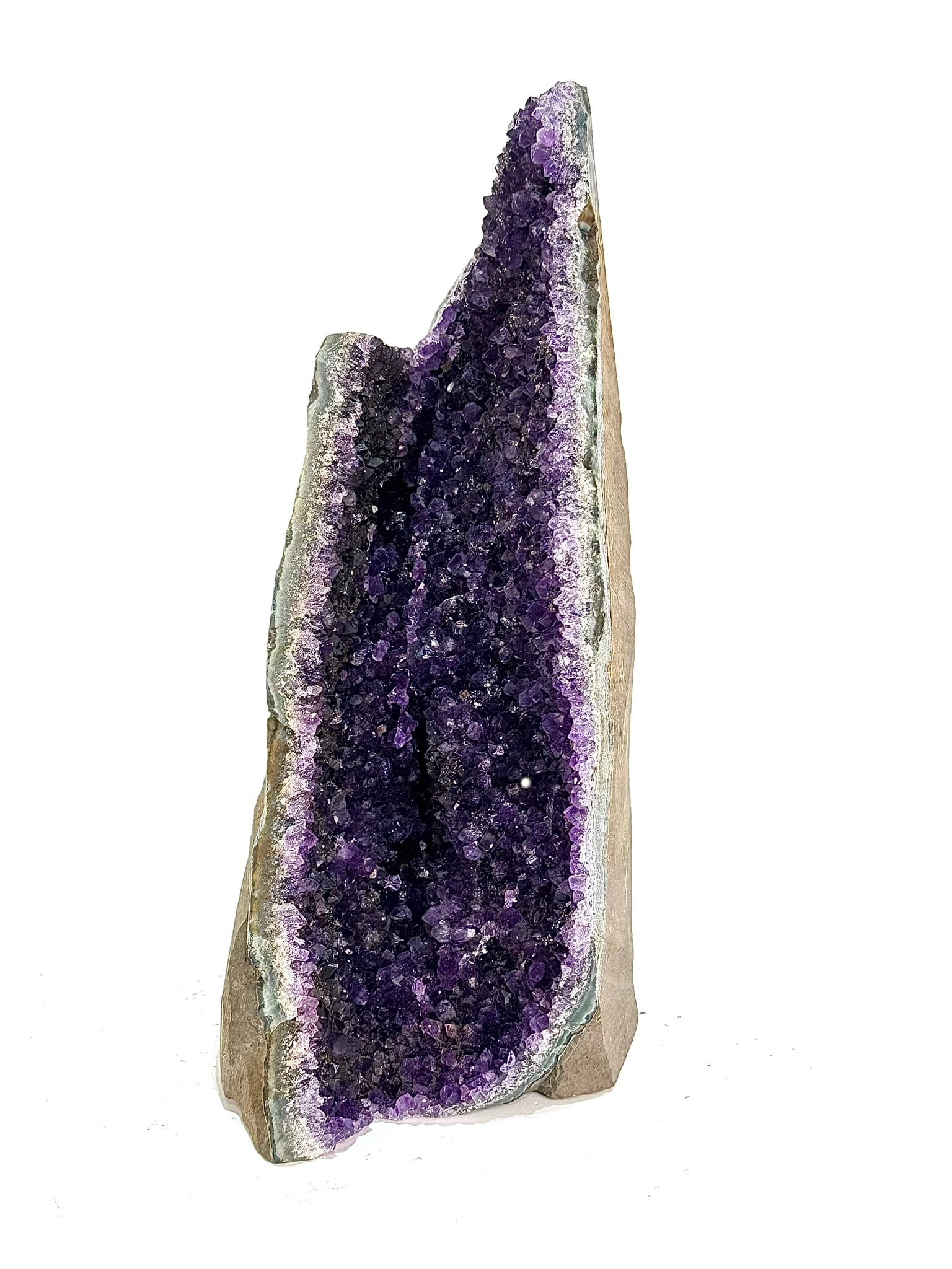 Uruguayan Amethyst Cluster: Dark purple freestanding Uruguayan amethyst cluster. 10.5" x 6.5" x 4.5". 7 lbs, 6 oz.