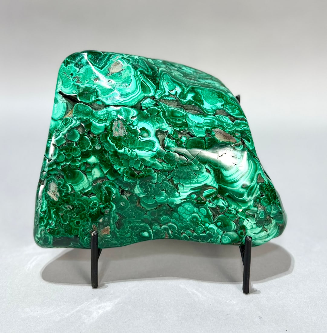 Polished Malachite Formation: Polished malachite formation from the DR Congo. 6" x 7" x 2.25". 6 lb, 10 ounces.