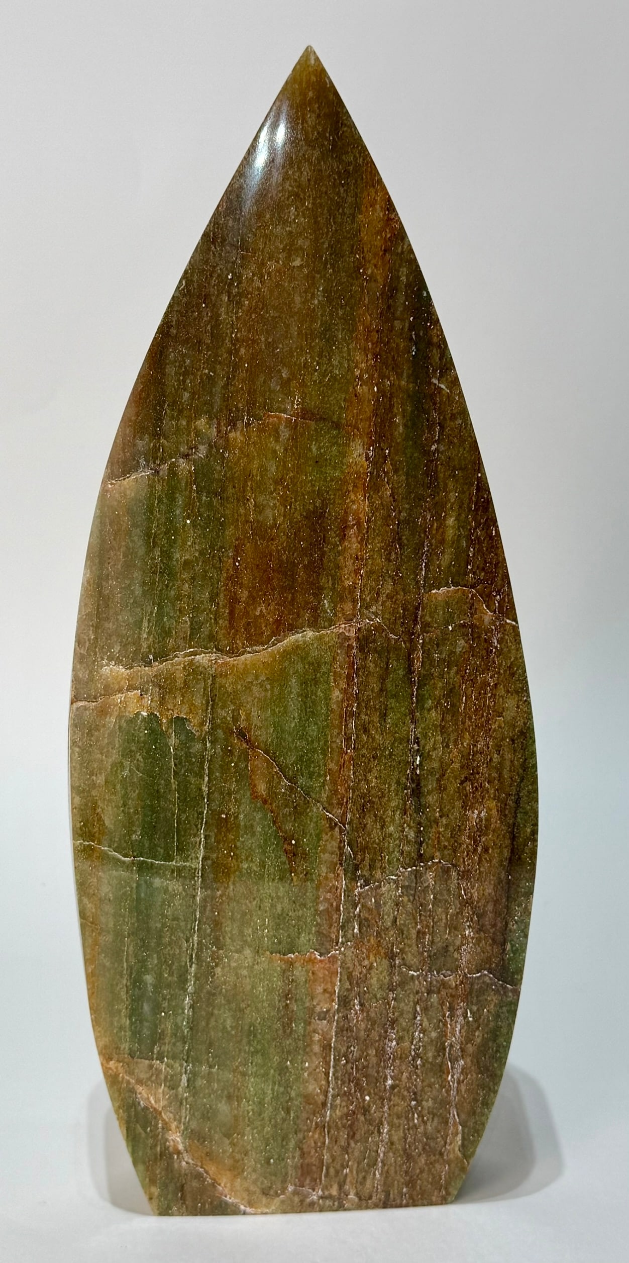 Polished Aventurine Flame: Polished aventurine flame from Brazil. Natural fractures on both sides. 12.5" x 5" x 1.75". 6 lb, 13 ounces.