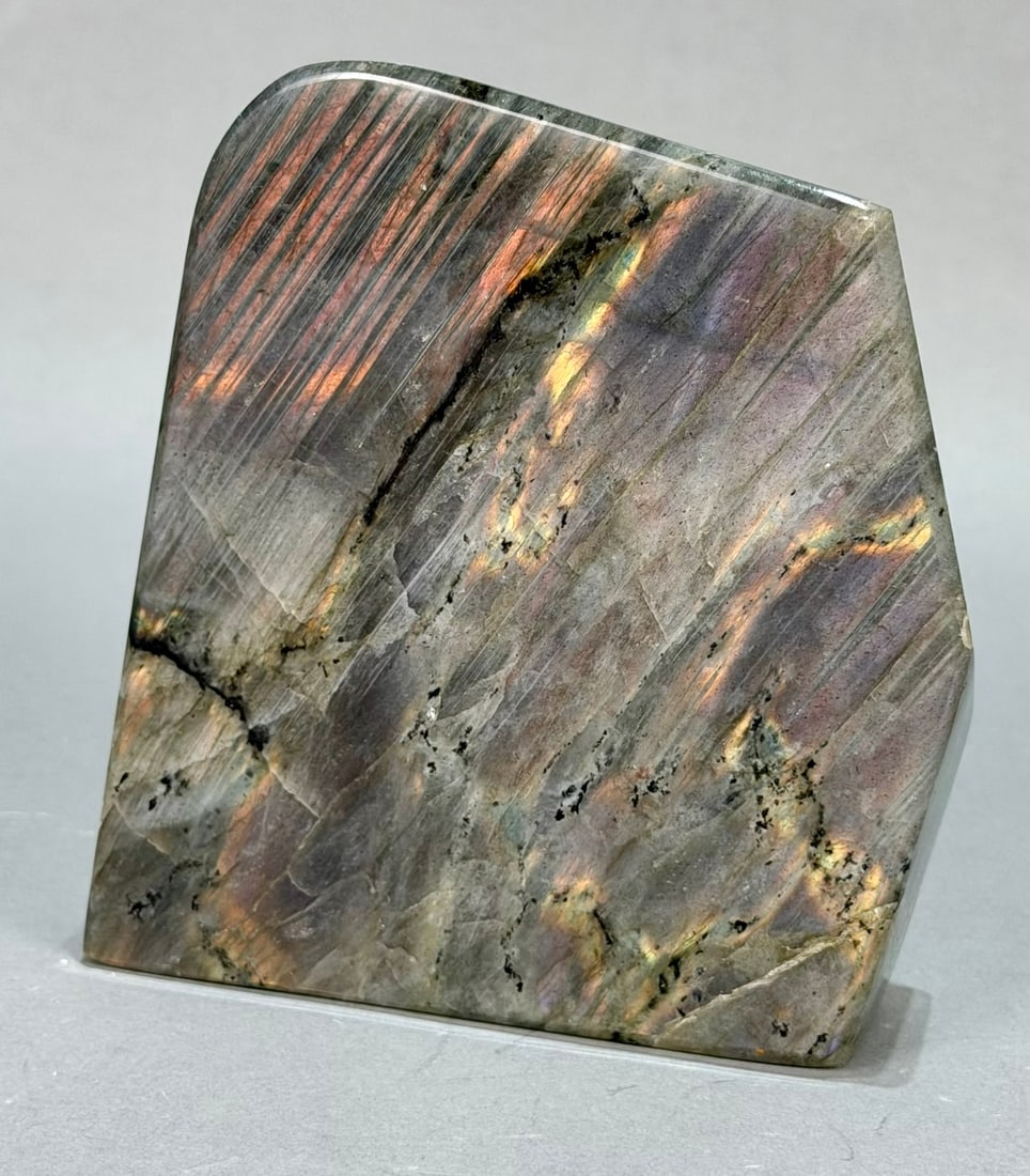 Polished Pink/Purple Labradorite Freeform: Rare polished pink/purple labradorite freeform from Madagascar. 4.5" x 4" x 1". 1 lb, 13 ounces.
