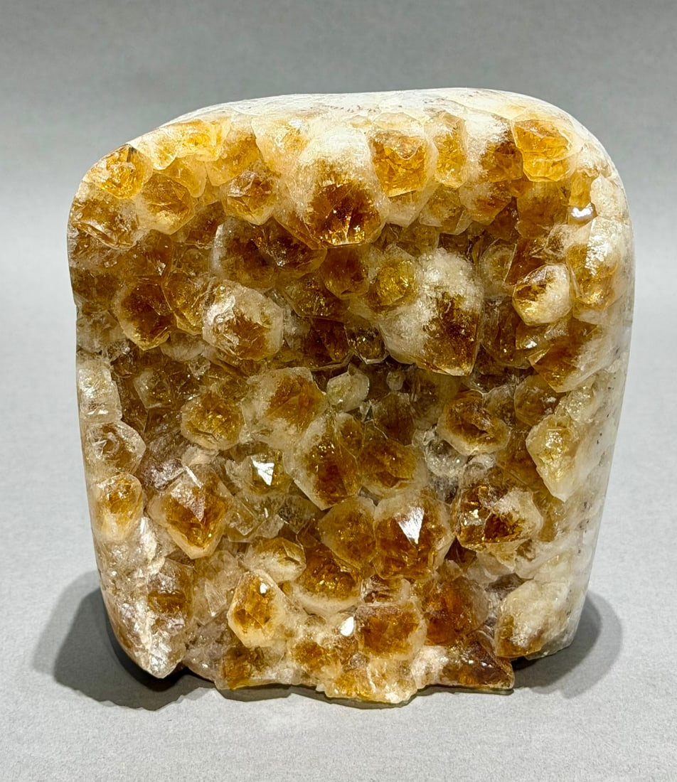 Citrine Cluster: Freestanding citrine cluster with polished edges and calcite crystals. 5.5" x 5.5" x 3". 4 lbs, 15 oz.
