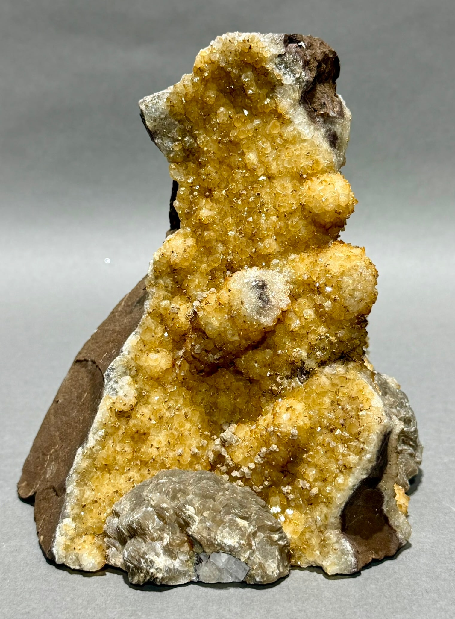 Citrine Geode With Stalactites: Citrine geode with stalactites from Brazil. 6.5" x 5.5" x 4.5". 3.86 pounds.