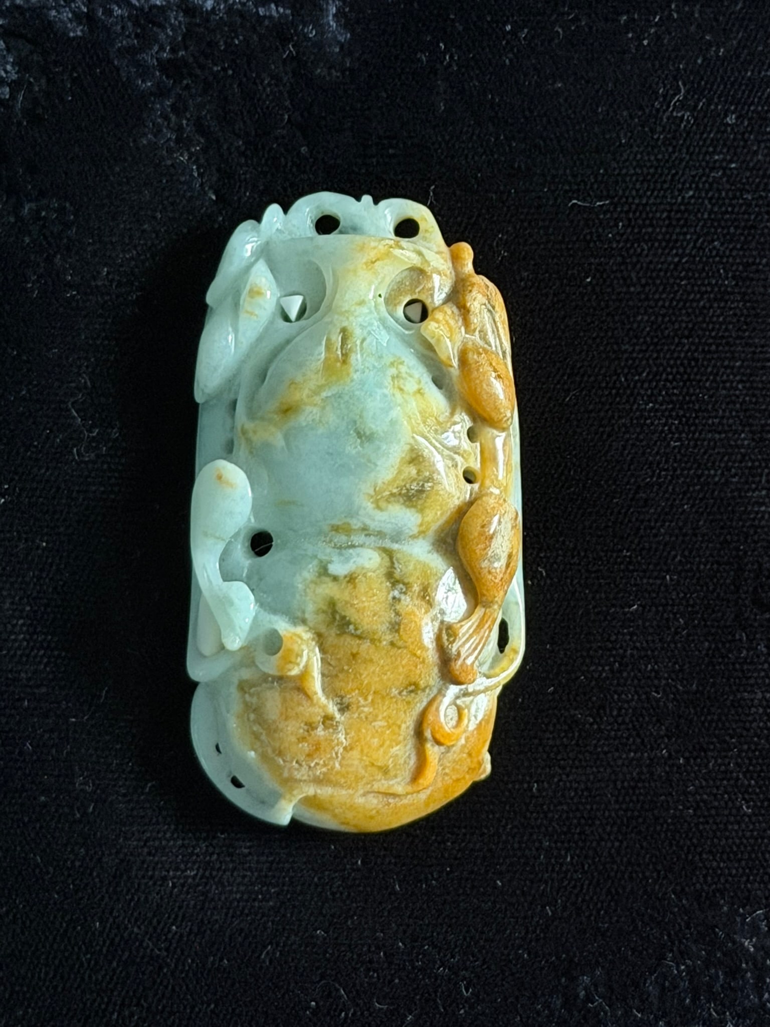 Large Carved Jade Pendant: Large carved jade pendant from China. 2.25" x 1.25" x .3". 50 grams.