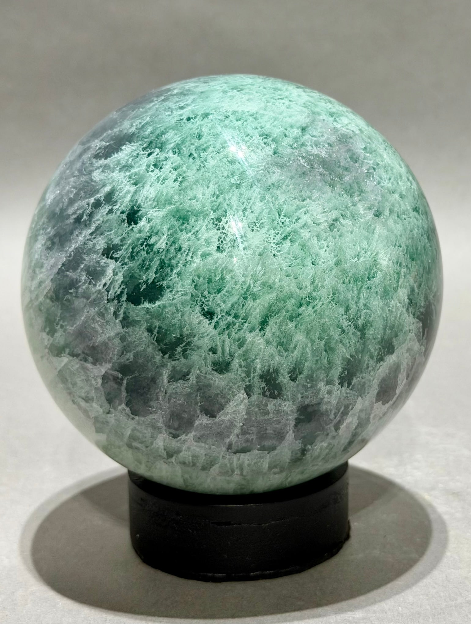 Polished Fluorite Sphere: Polished fluorite sphere from China. 4.25” x 4.25" x 4.25". 5 lbs.