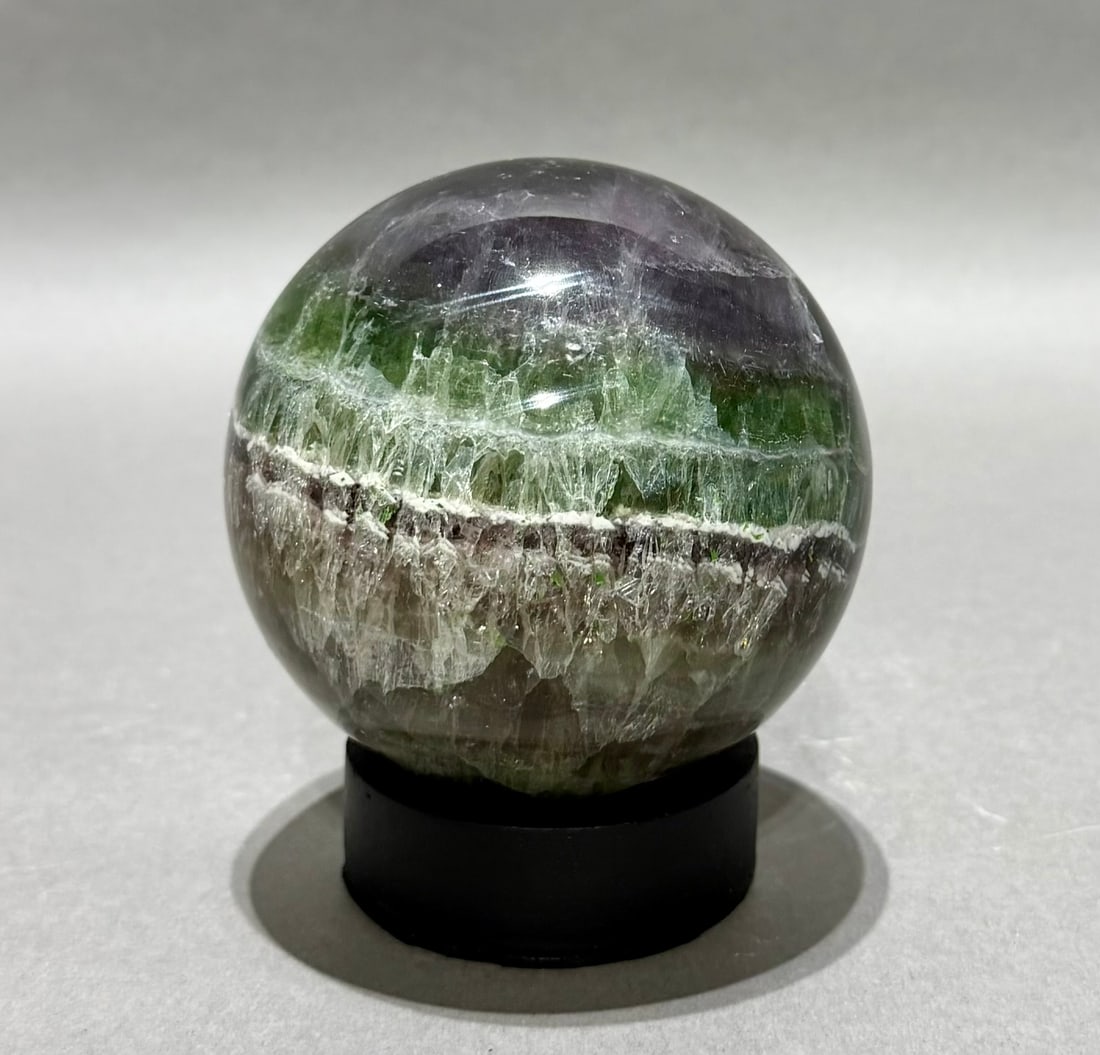 Polished Fluorite Sphere: Polished fluorite sphere from China. 3.5” x 3.5" x 3.5". 2.9 lbs.