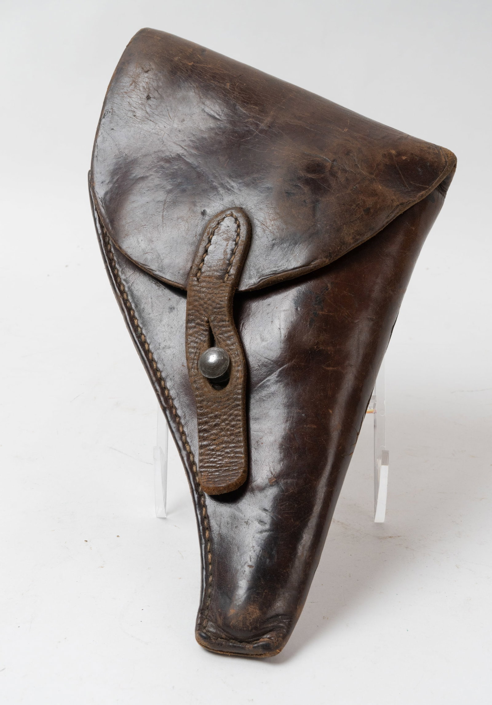 French Model 1892 Lebel Military Service Holster.: Brown leather service revolver holster with brass hangers. No makers stamps are visible. Scuff and use marks throughout.
